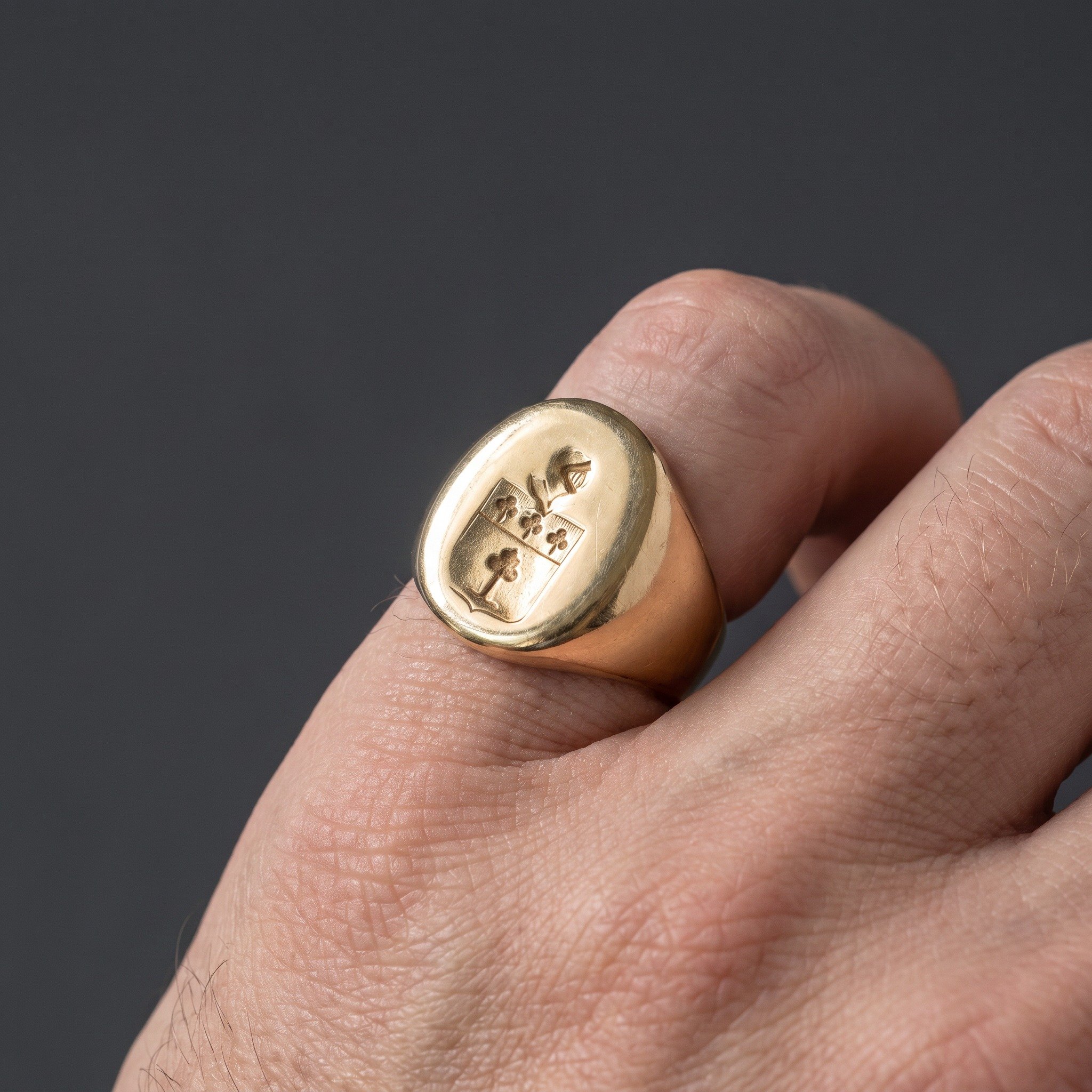 antique-french-18kt-gold-signet-ring-knights-helmet-heraldic-shield-03-worn-Mozeris-Fine-Antiques.jpg
