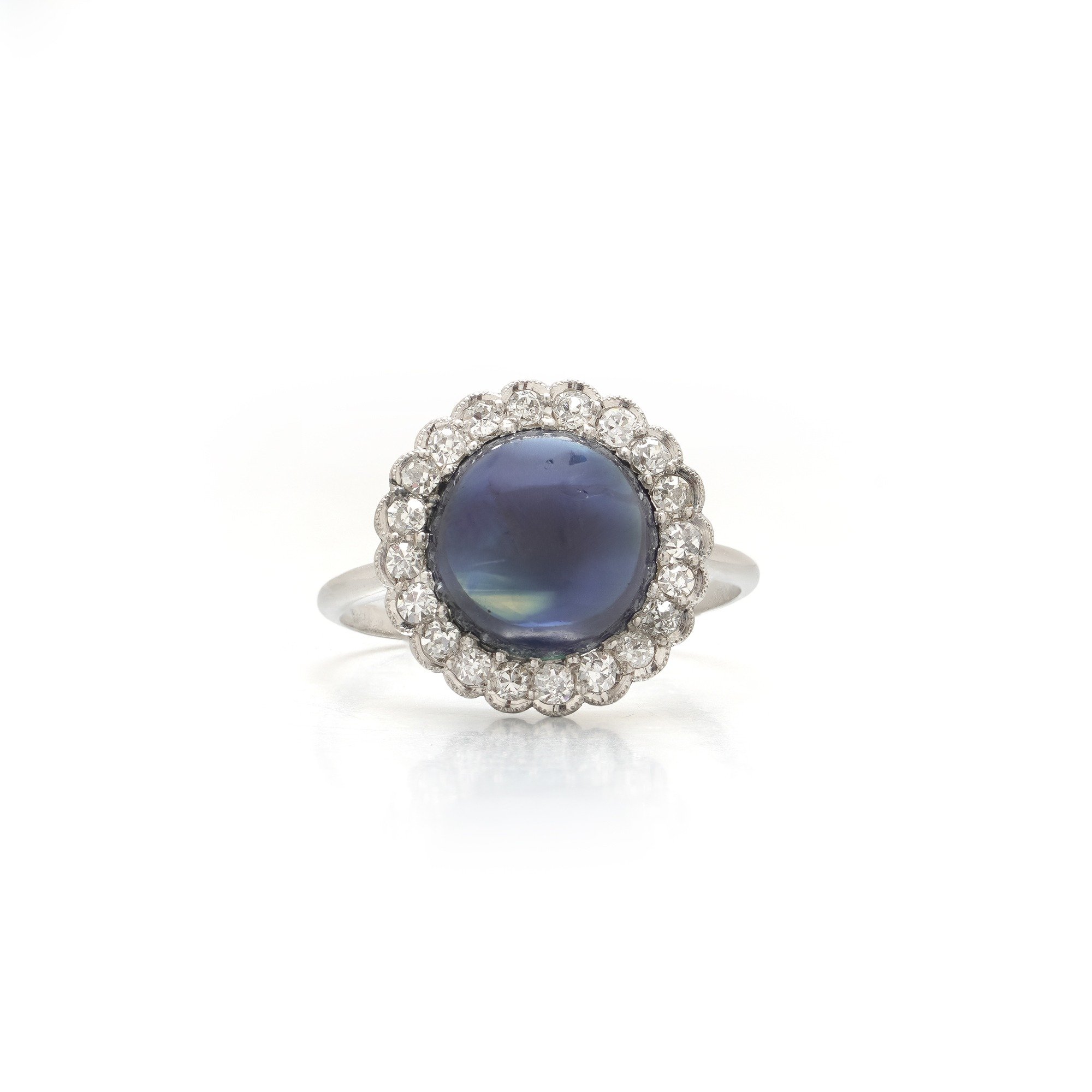 art-deco-platinum-cabochon-sapphire-diamond-cluster-ring-4-00-ct-01-Mozeris-Fine-Antiques.jpg
