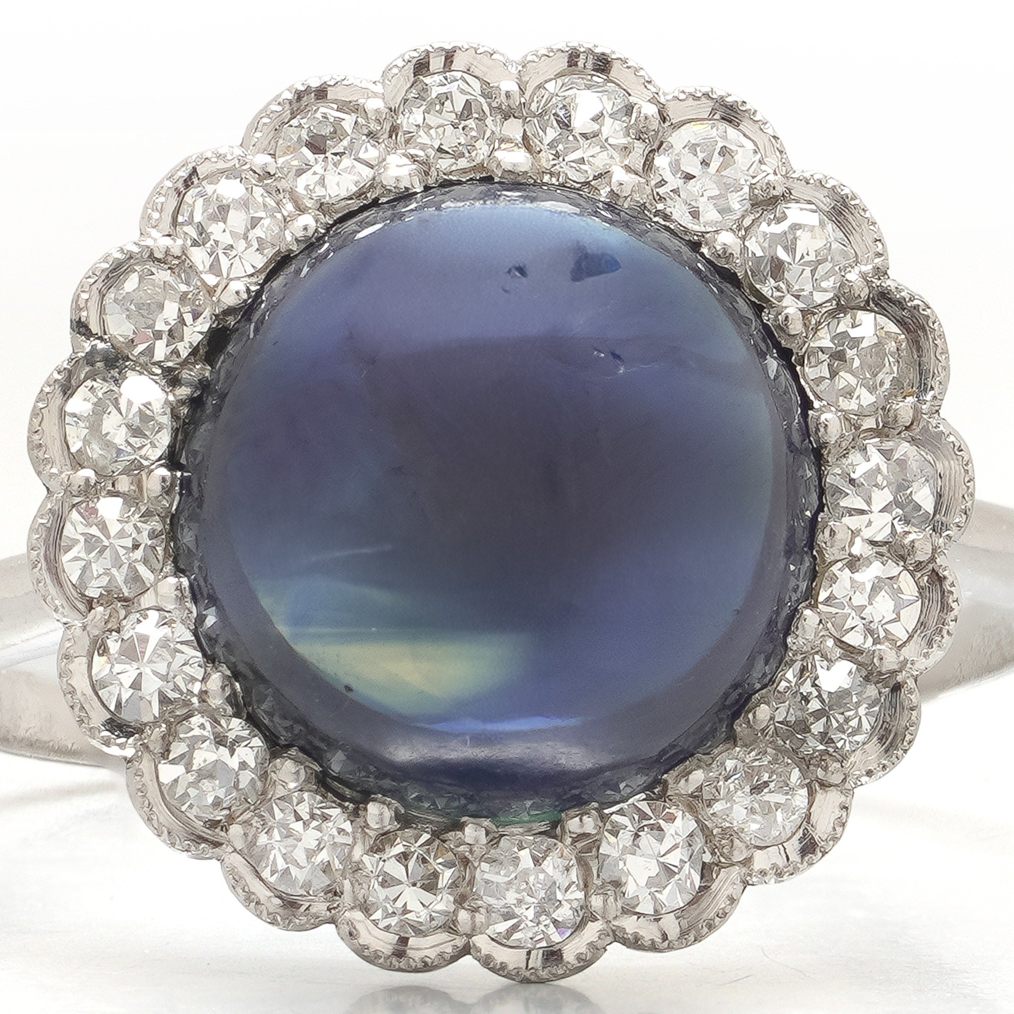 art-deco-platinum-cabochon-sapphire-diamond-cluster-ring-4-00-ct-04-Mozeris-Fine-Antiques.jpg