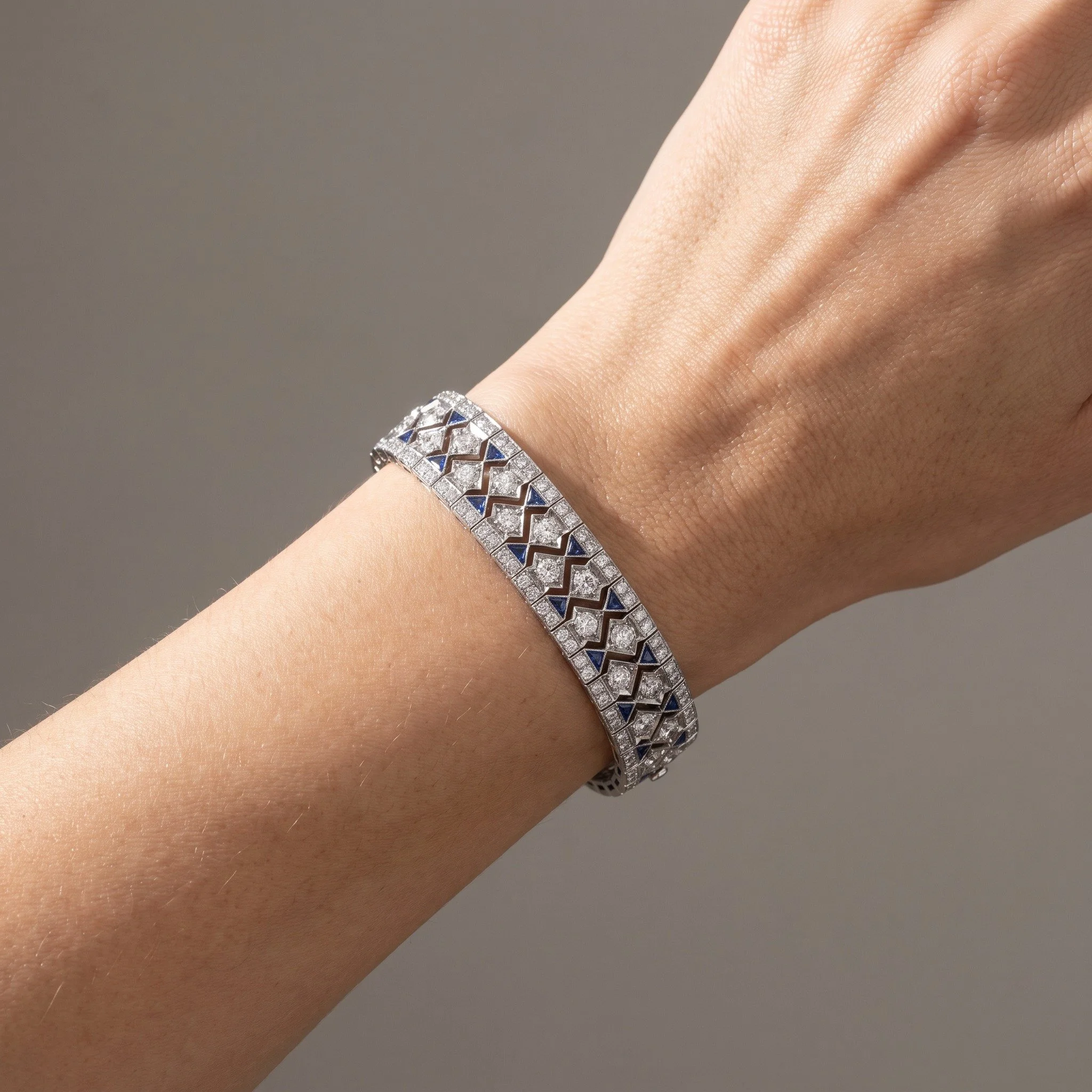 art-deco-platinum-diamond-sapphire-lattice-bracelet-8-28-ct-02-worn-Mozeris-Fine-Antiques.jpg