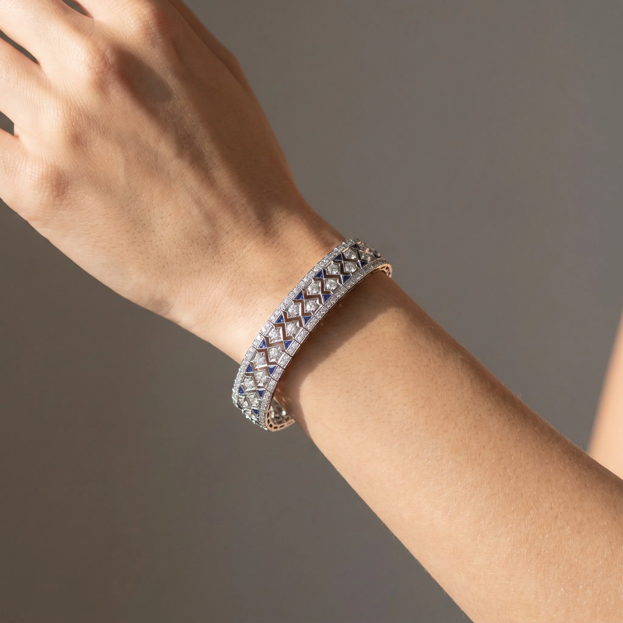 art-deco-platinum-diamond-sapphire-lattice-bracelet-8-28-ct-03-worn-Mozeris-Fine-Antiques.jpg