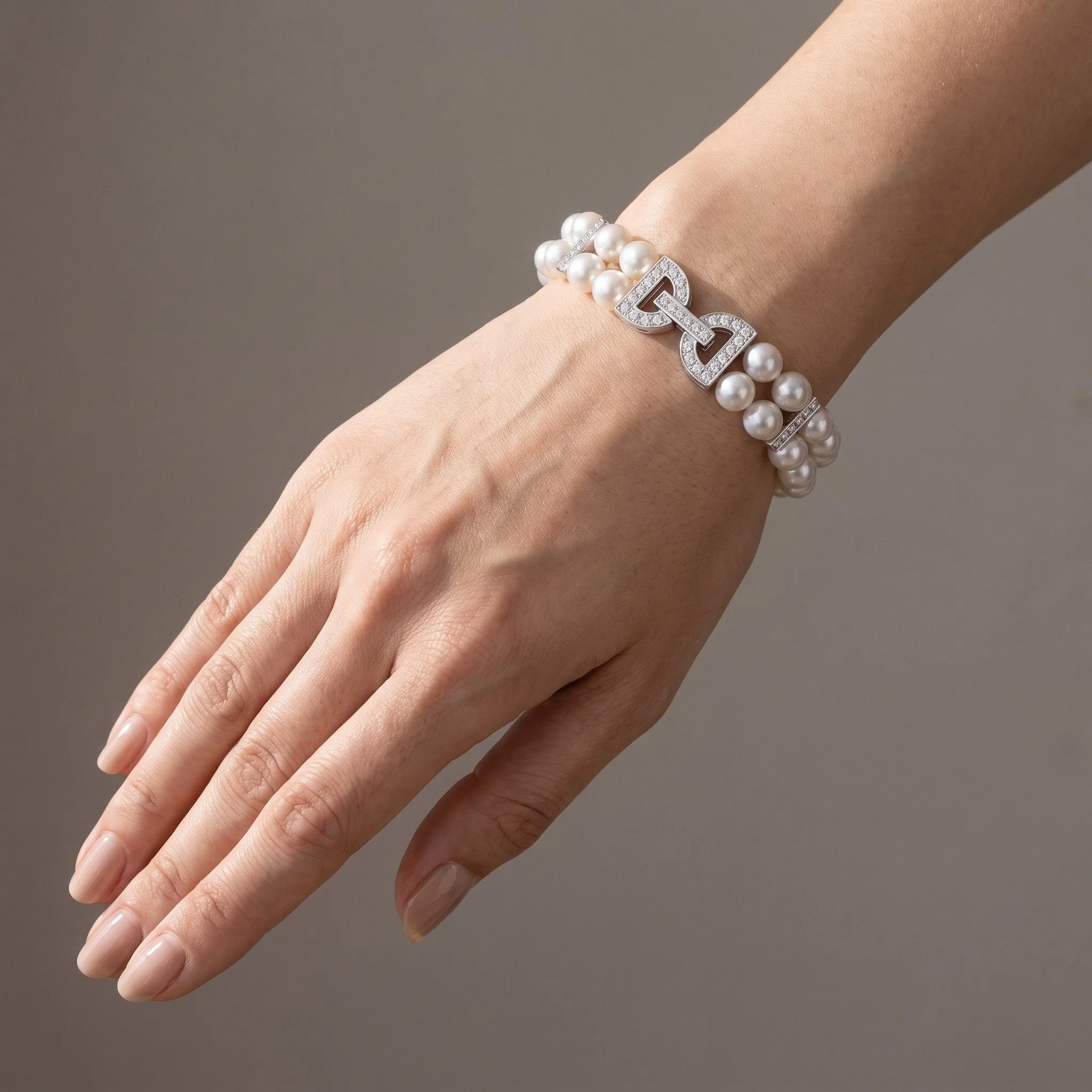 mikimoto-double-strand-cultured-pearl-diamond-bracelet-18kt-white-gold-03-worn-Mozeris-Fine-Antiques.jpg