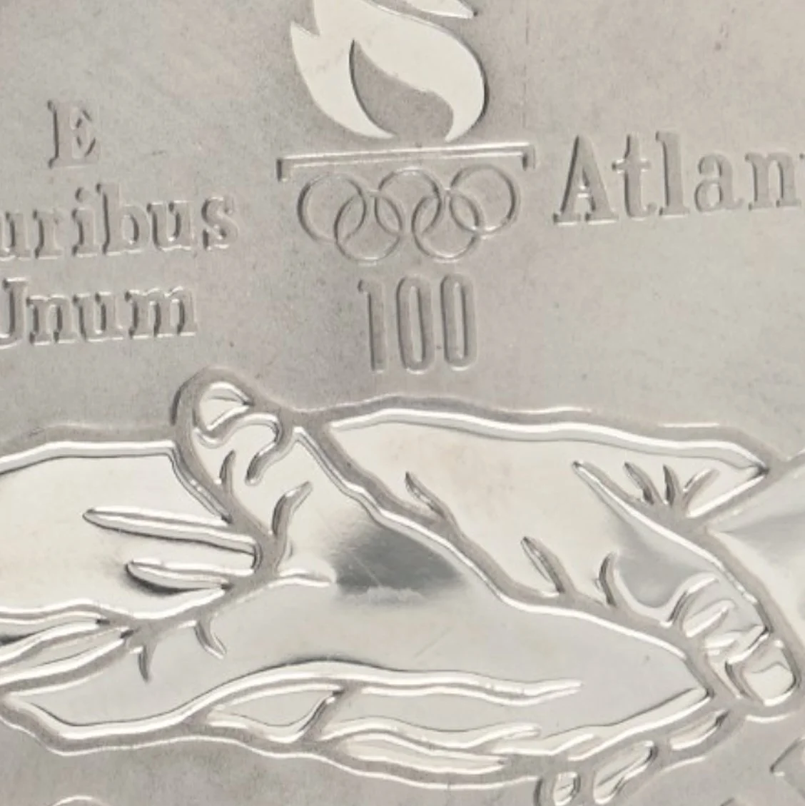 atlanta-1996-olympic-track-and-field-silver-dollar-1995-05-closeup-2-reverse-Mozeris-Fine-Antiques.jpg