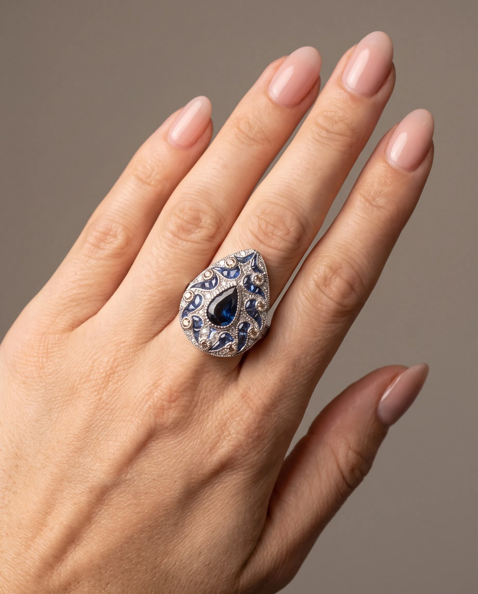 art-deco-style-platinum-sapphire-and-diamond-pear-cluster-ring-worn2-Mozeris-Fine-Antiques.jpg