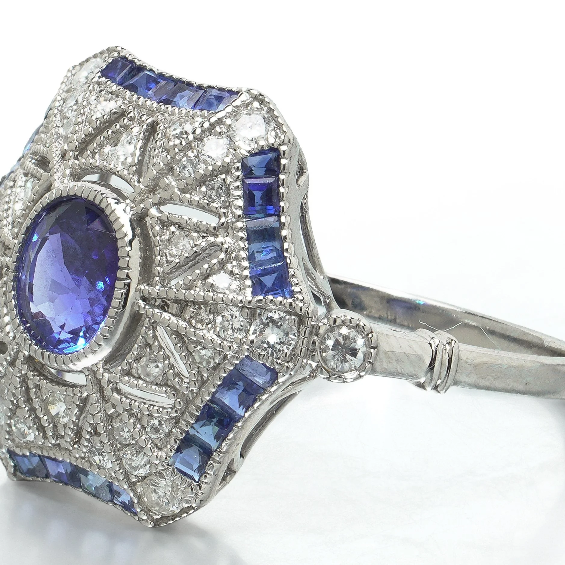 art-deco-style-platinum-sapphire-and-diamond-hexagonal-star-ring-07-angle-Mozeris-Fine-Antiques.jpg