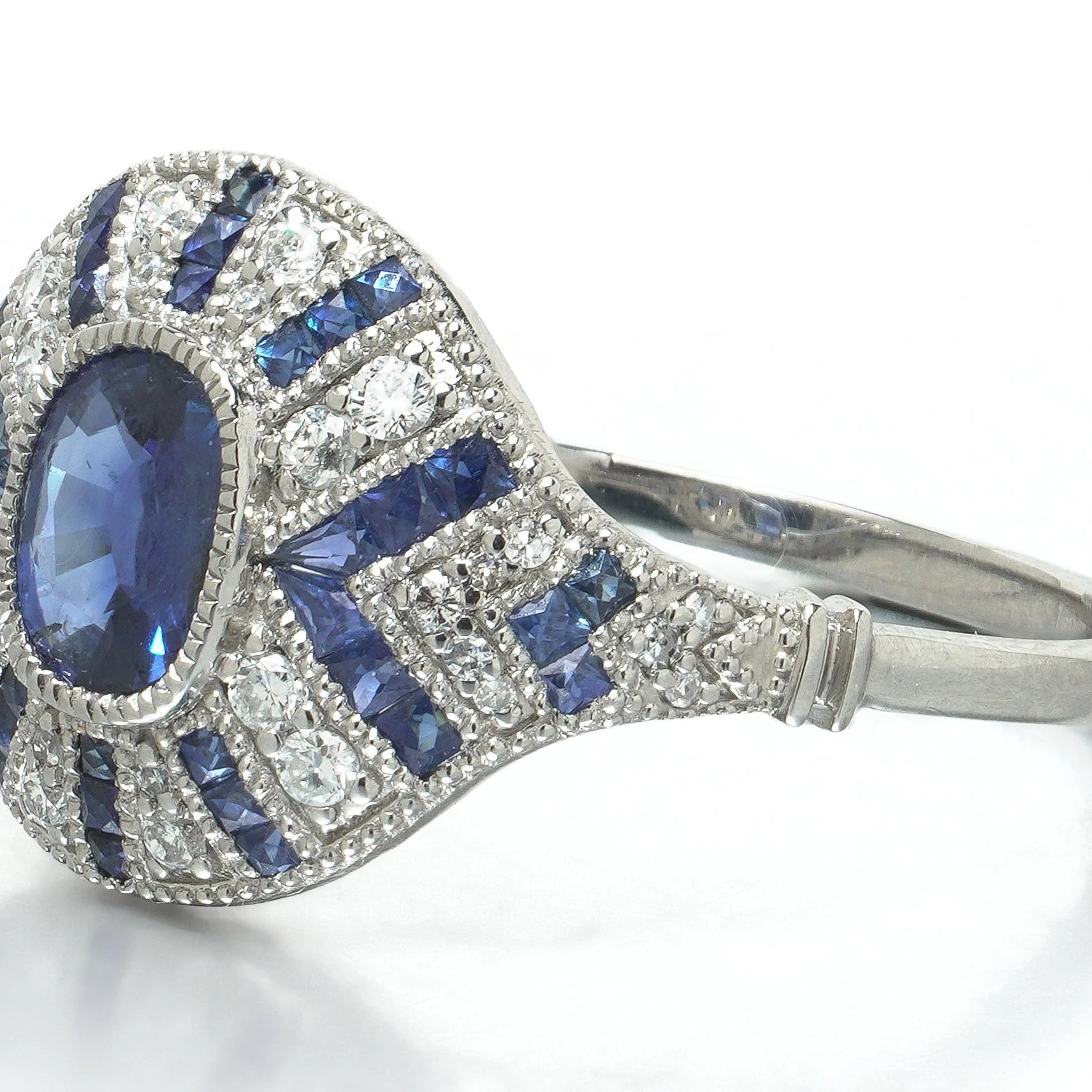 art-deco-style-platinum-sapphire-and-diamond-navette-rayed-ring-07-angle-Mozeris-Fine-Antiques.jpg