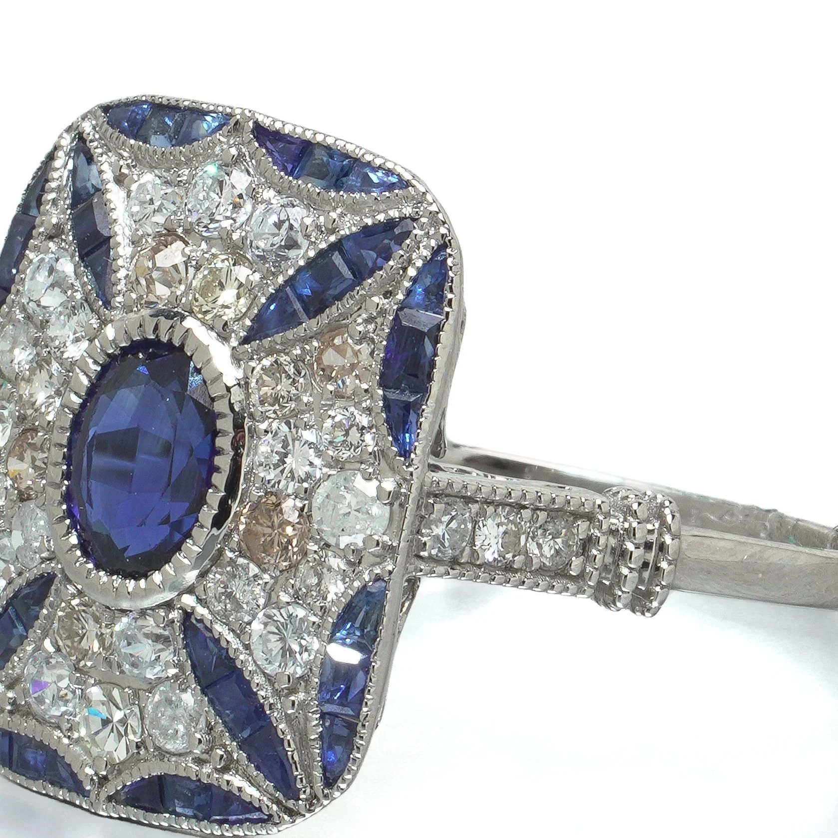 art-deco-style-platinum-sapphire-and-diamond-cushion-plaque-ring-09-angle-Mozeris-Fine-Antiques.jpg