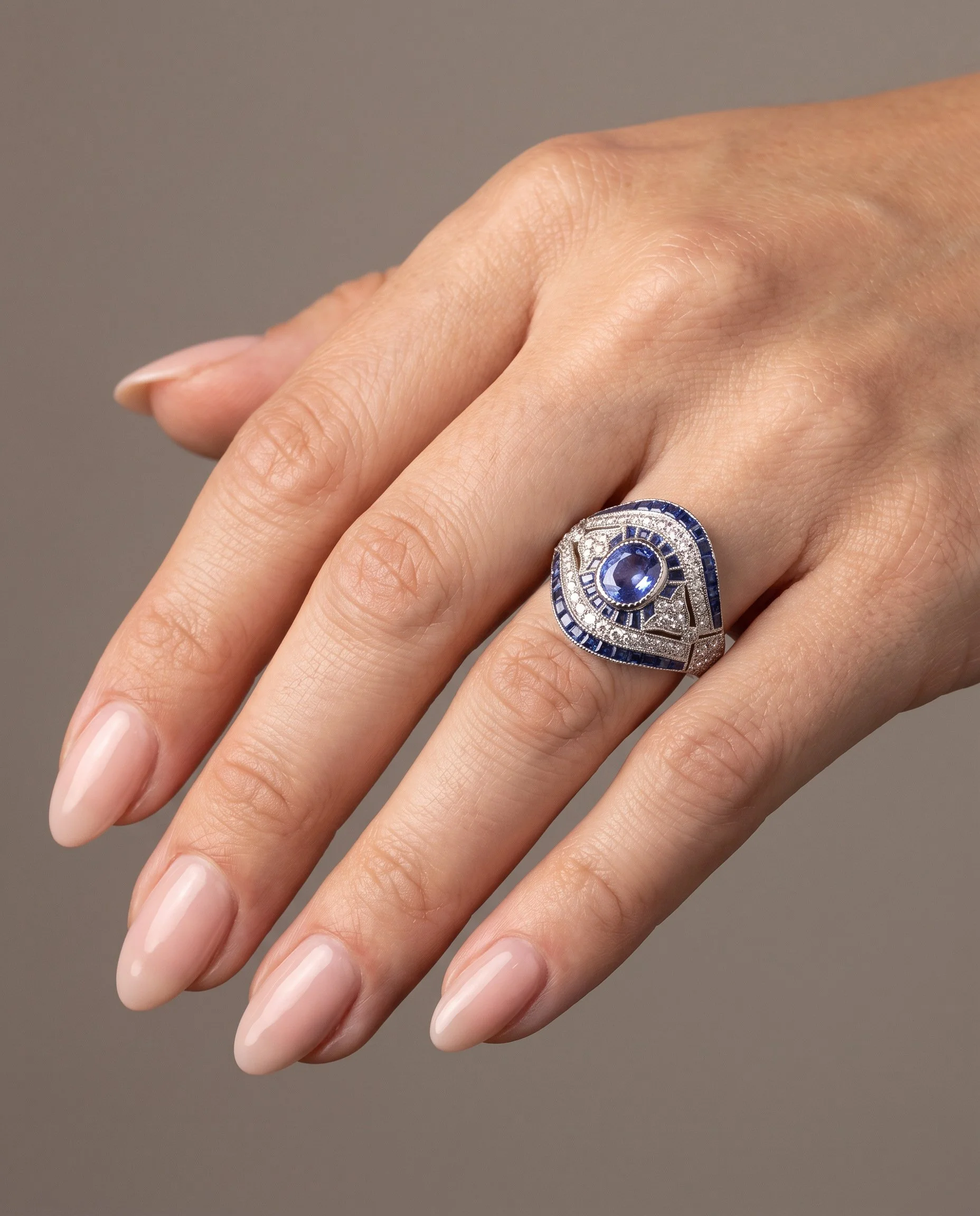 art-deco-style-platinum-109ct-sapphire-and-diamond-bombe-navette-ring-worn1-Mozeris-Fine-Antiques.jpg