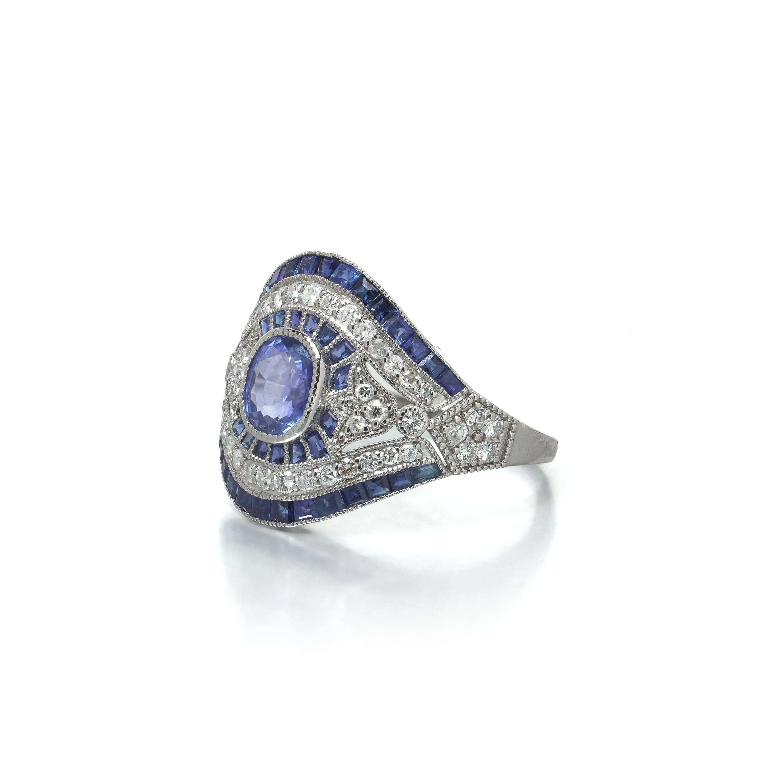 art-deco-style-platinum-109ct-sapphire-and-diamond-bombe-navette-ring-03-view3-Mozeris-Fine-Antiques.jpg