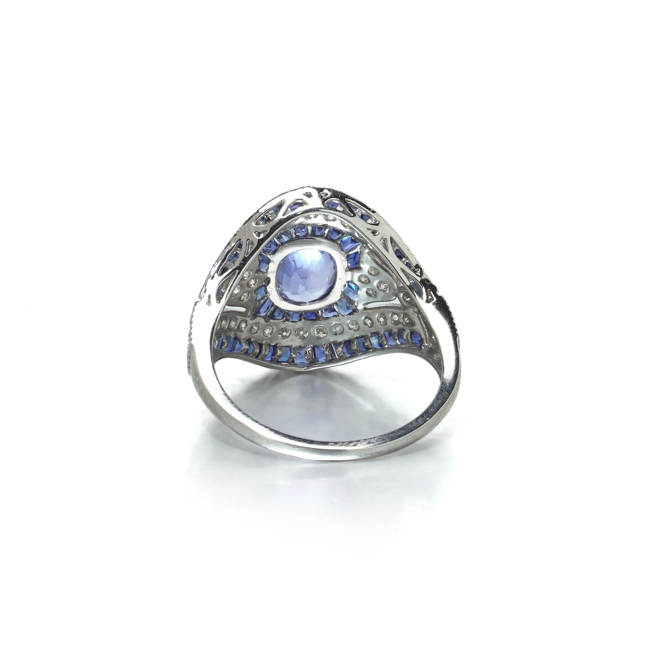 art-deco-style-platinum-109ct-sapphire-and-diamond-bombe-navette-ring-04-view4-Mozeris-Fine-Antiques.jpg