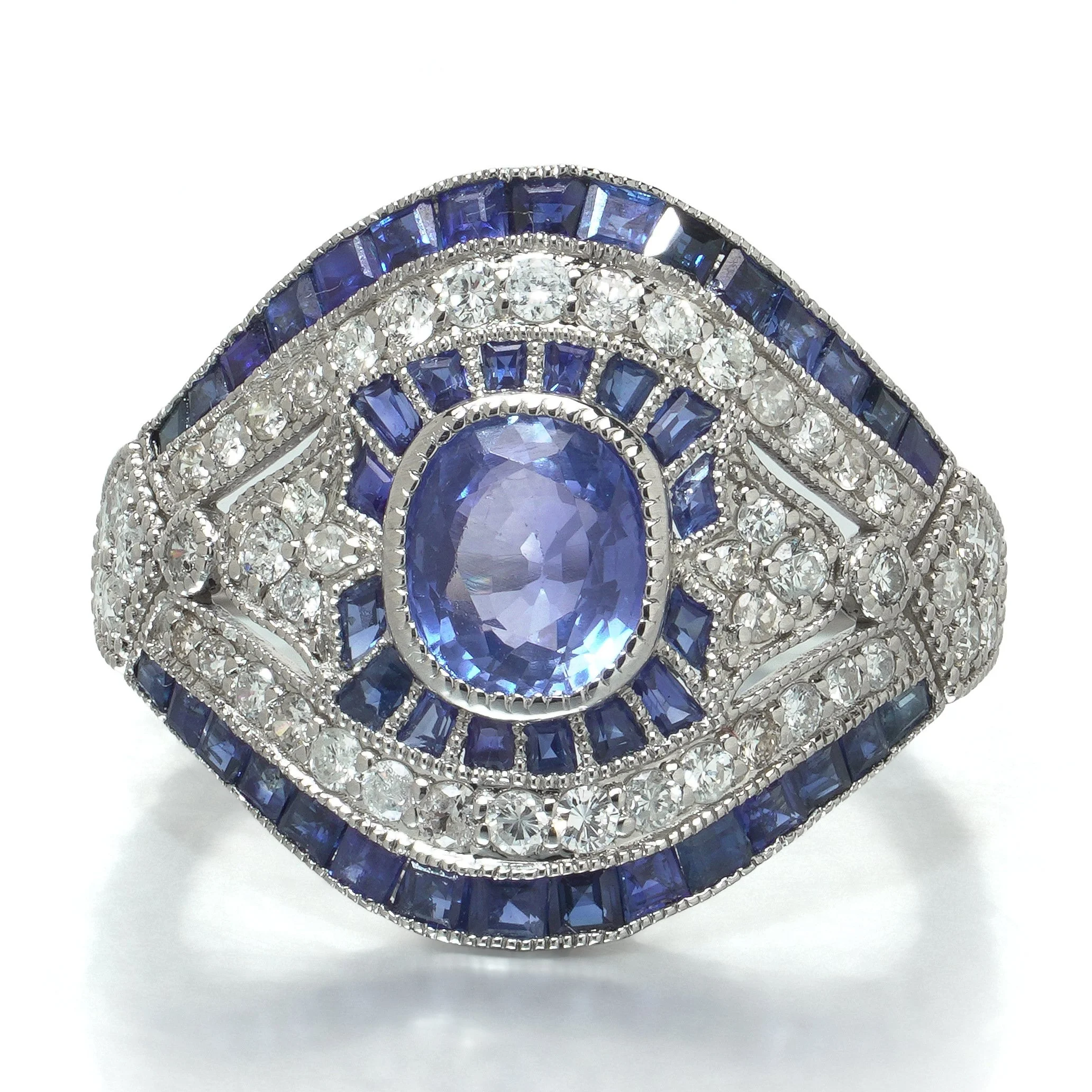 art-deco-style-platinum-109ct-sapphire-and-diamond-bombe-navette-ring-05-head-Mozeris-Fine-Antiques.jpg