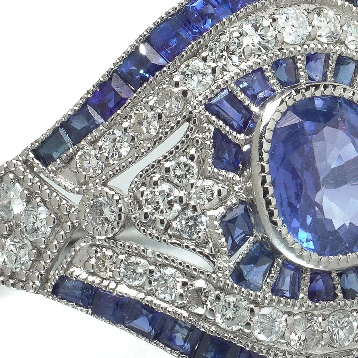 art-deco-style-platinum-109ct-sapphire-and-diamond-bombe-navette-ring-06-centre-Mozeris-Fine-Antiques.jpg