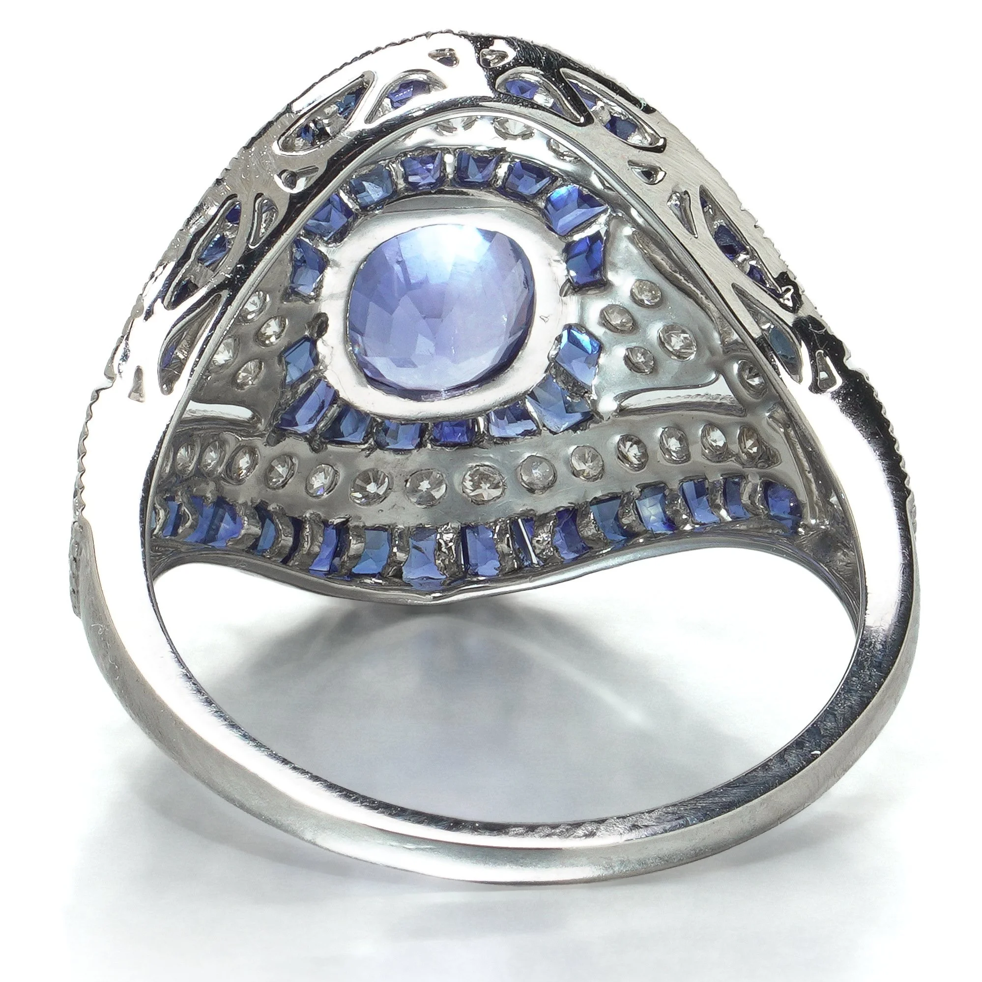 art-deco-style-platinum-109ct-sapphire-and-diamond-bombe-navette-ring-08-gallery-Mozeris-Fine-Antiques.jpg