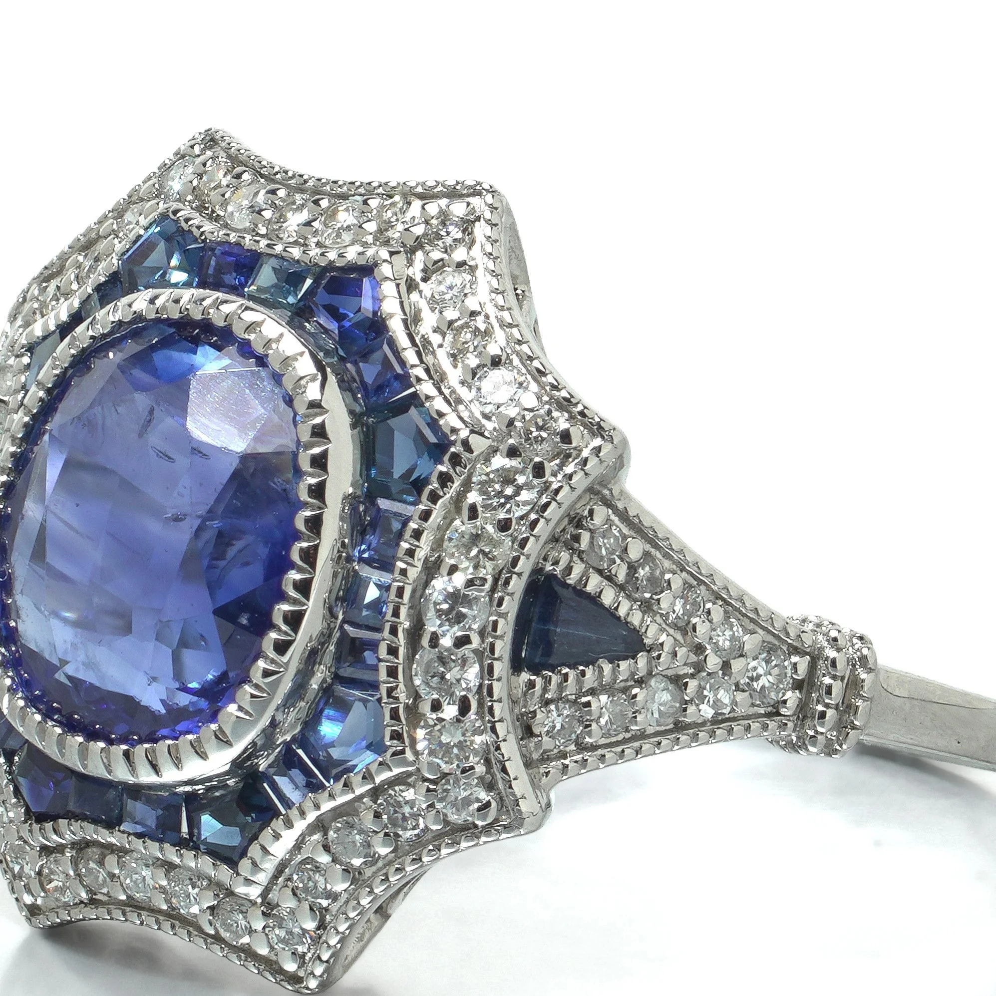 art-deco-style-platinum-256ct-sapphire-and-diamond-shield-ring-07-angle-Mozeris-Fine-Antiques.jpg