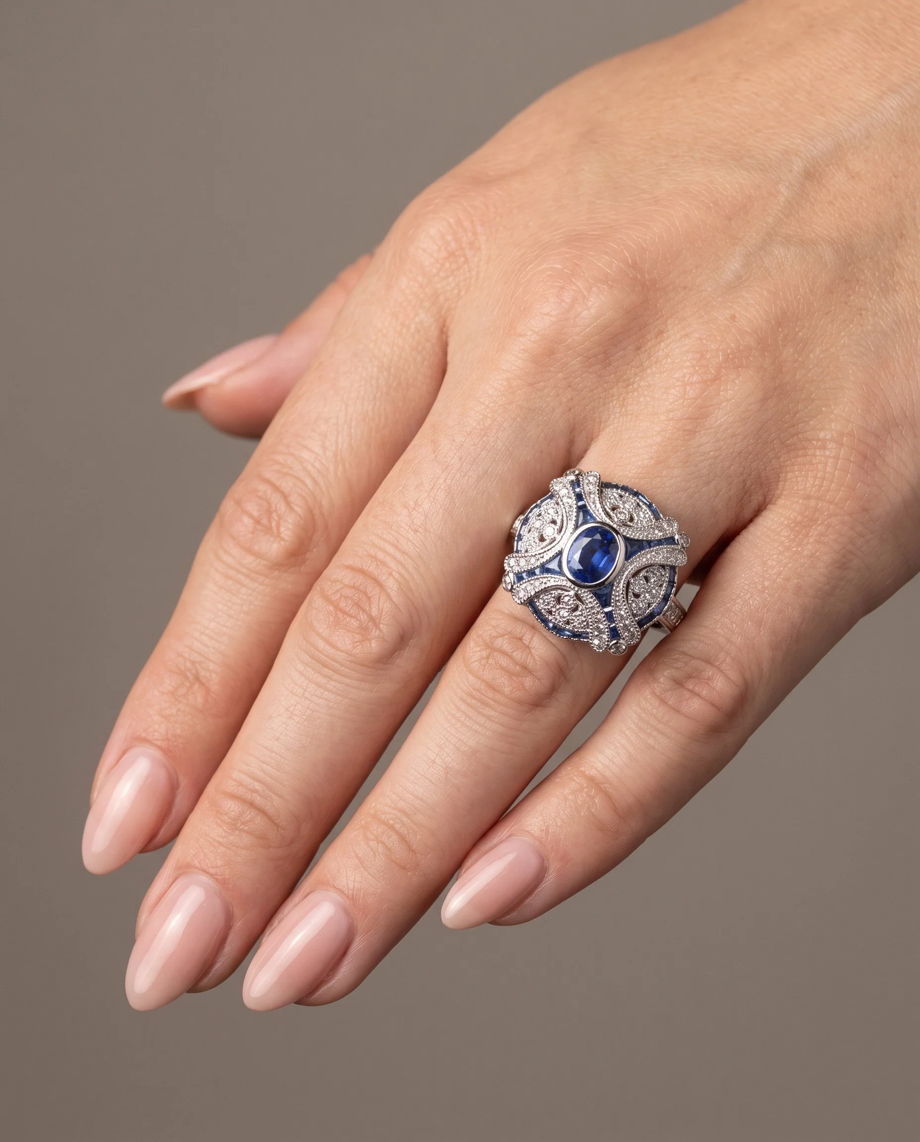 art-deco-style-platinum-sapphire-and-diamond-domed-bombe-ring-worn1-Mozeris-Fine-Antiques.jpg