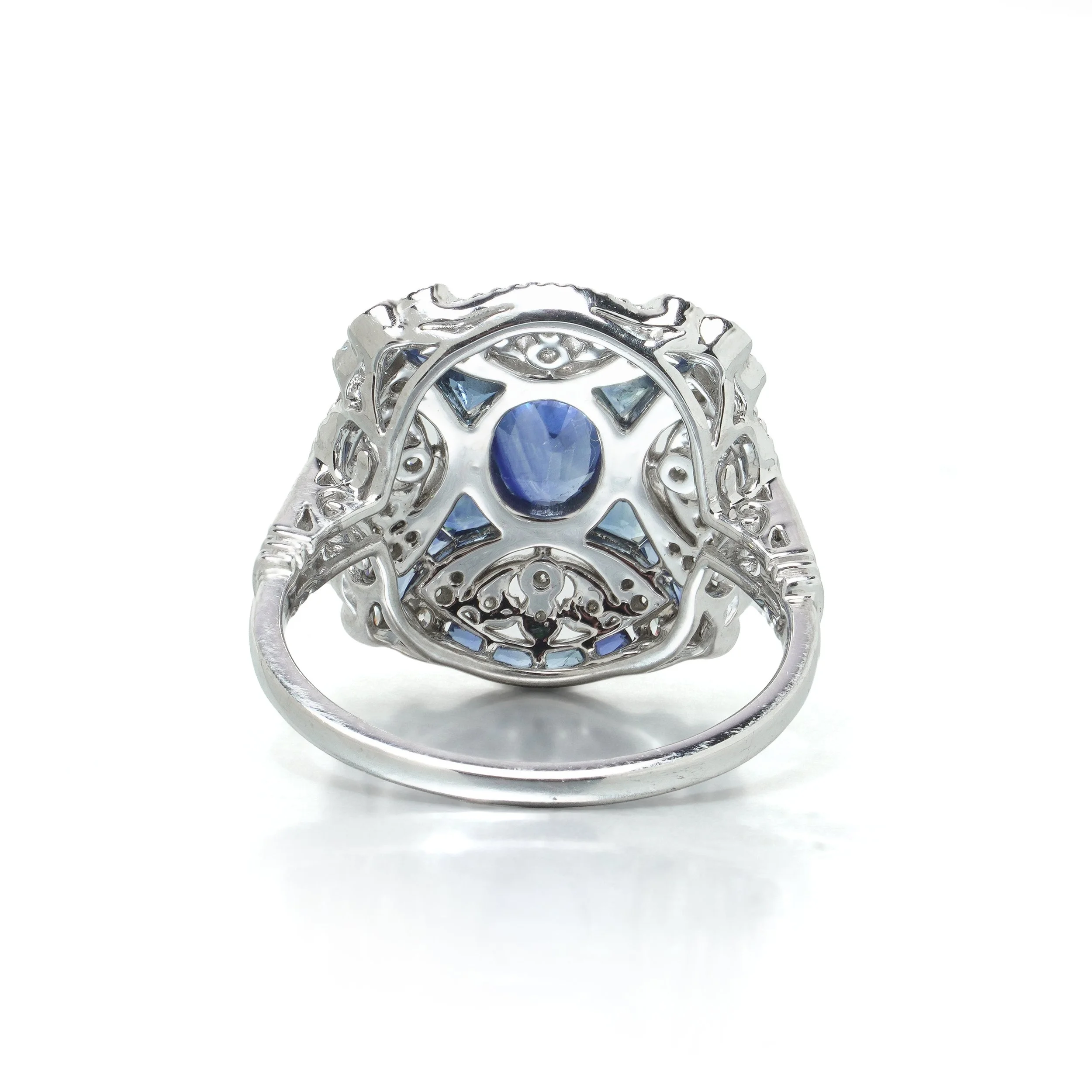 art-deco-style-platinum-sapphire-and-diamond-domed-bombe-ring-04-view4-Mozeris-Fine-Antiques.jpg
