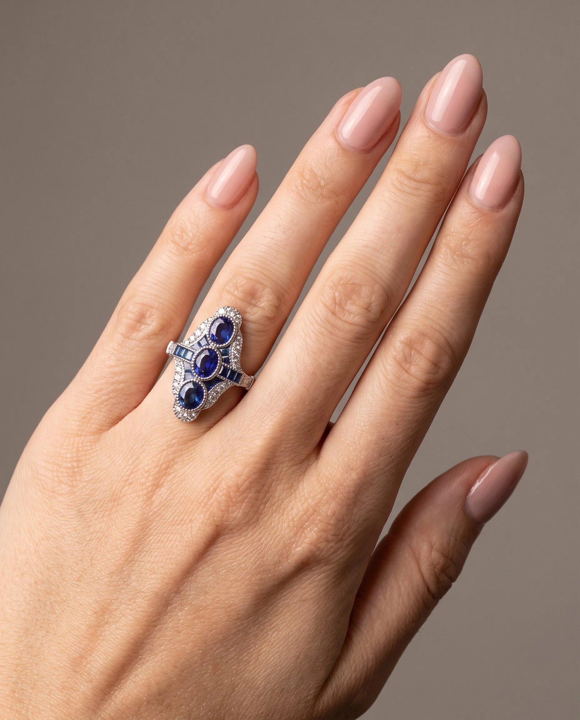 art-deco-style-platinum-three-stone-sapphire-and-diamond-navette-ring-worn1-Mozeris-Fine-Antiques.jpg