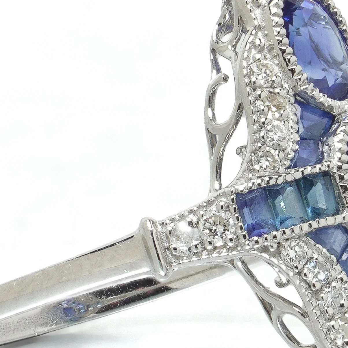 art-deco-style-platinum-three-stone-sapphire-and-diamond-navette-ring-06-centre-Mozeris-Fine-Antiques.jpg