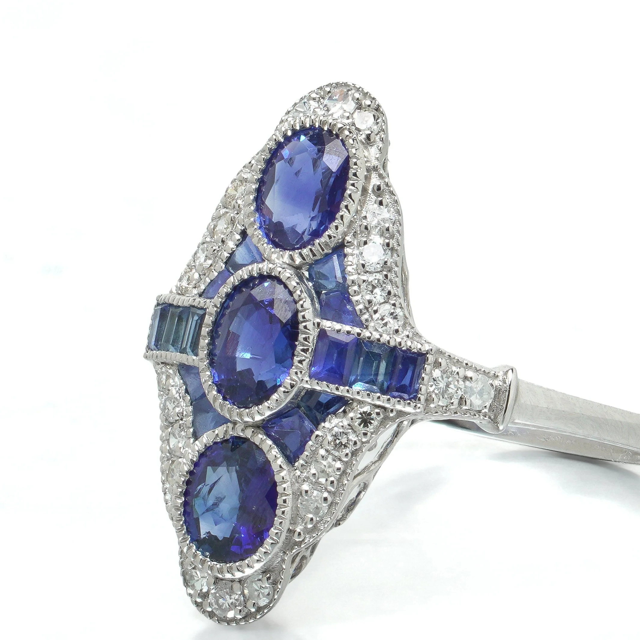 art-deco-style-platinum-three-stone-sapphire-and-diamond-navette-ring-07-angle-Mozeris-Fine-Antiques.jpg