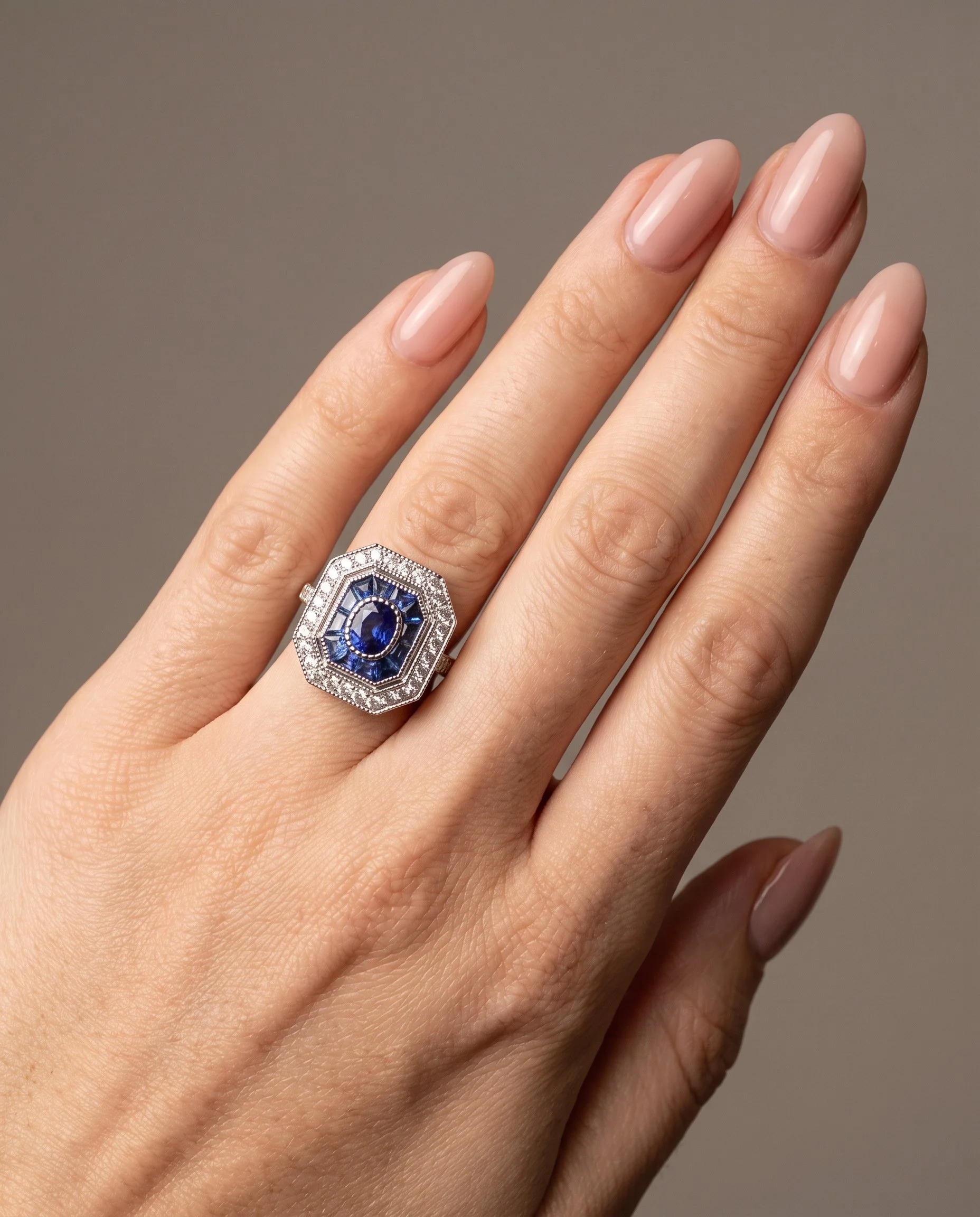 art-deco-style-platinum-sapphire-and-diamond-octagonal-target-ring-worn1-Mozeris-Fine-Antiques.jpg