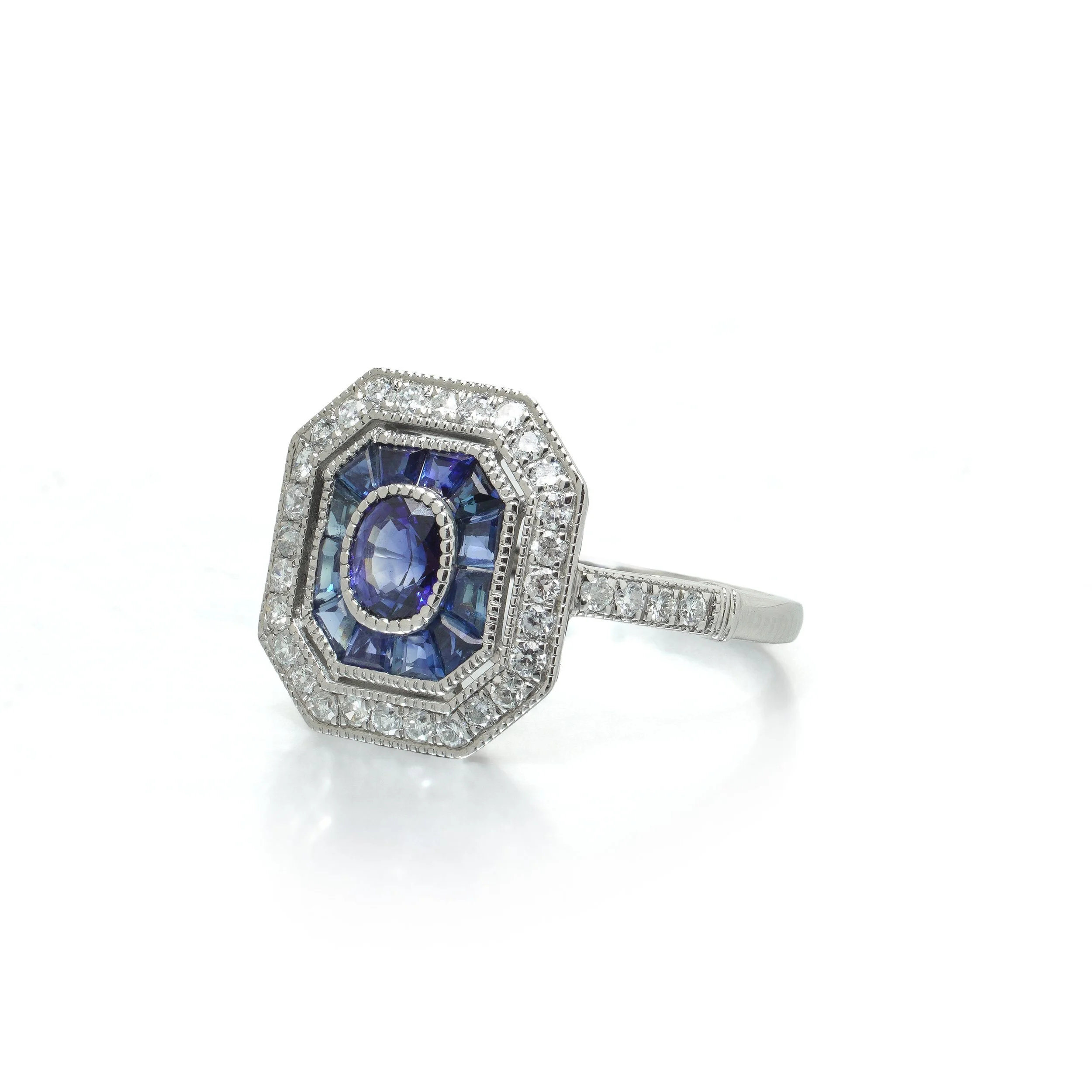 art-deco-style-platinum-sapphire-and-diamond-octagonal-target-ring-03-view3-Mozeris-Fine-Antiques.jpg