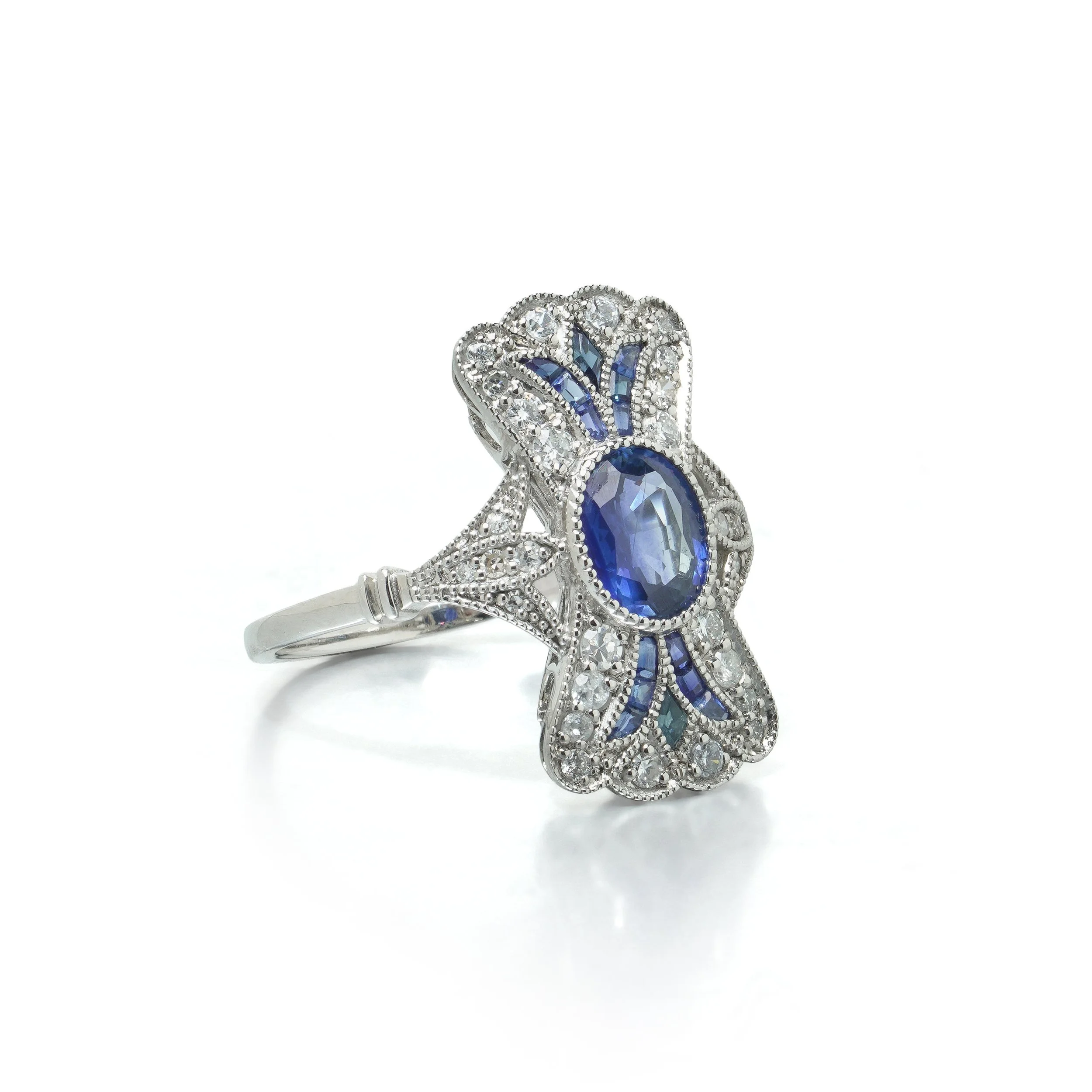 art-deco-style-platinum-111ct-sapphire-and-diamond-bow-plaque-ring-02-view2-Mozeris-Fine-Antiques.jpg