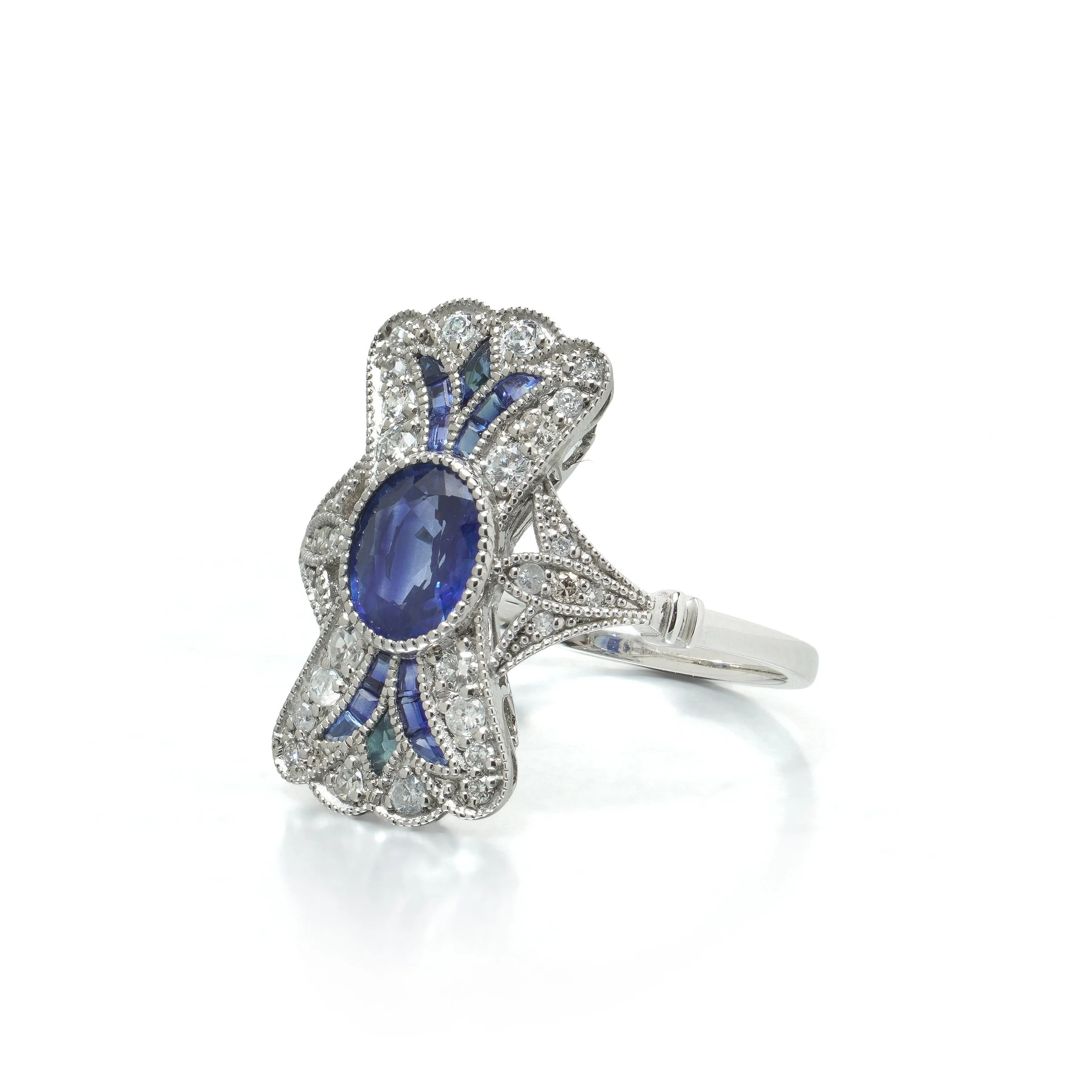 art-deco-style-platinum-111ct-sapphire-and-diamond-bow-plaque-ring-03-view3-Mozeris-Fine-Antiques.jpg