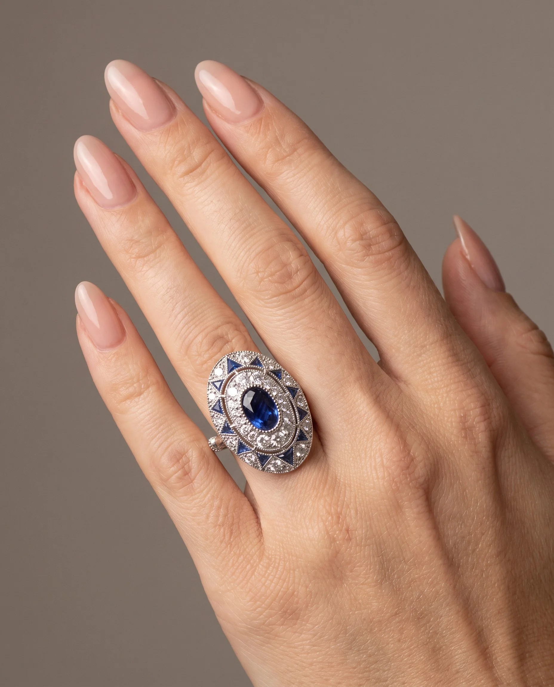 art-deco-style-platinum-113ct-sapphire-and-diamond-oval-plaque-ring-worn1-Mozeris-Fine-Antiques.jpg