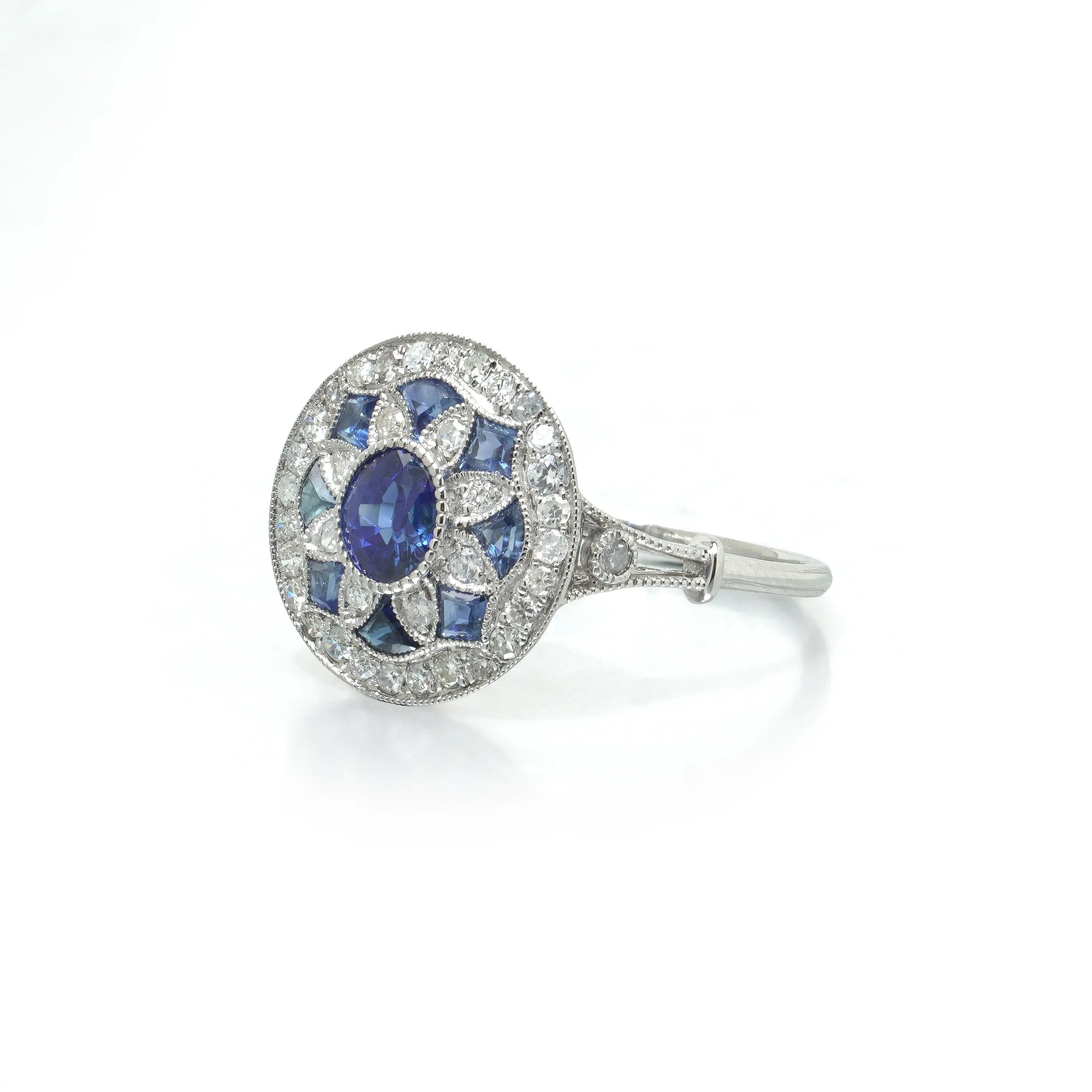 art-deco-style-platinum-sapphire-and-diamond-flowerhead-target-ring-02-view2-Mozeris-Fine-Antiques.jpg