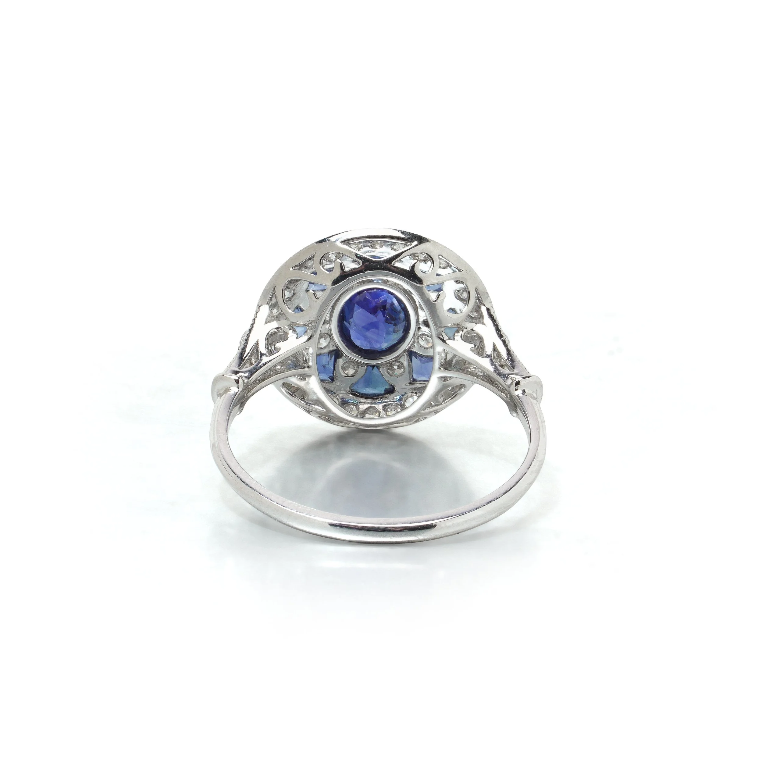 art-deco-style-platinum-sapphire-and-diamond-flowerhead-target-ring-04-view4-Mozeris-Fine-Antiques.jpg