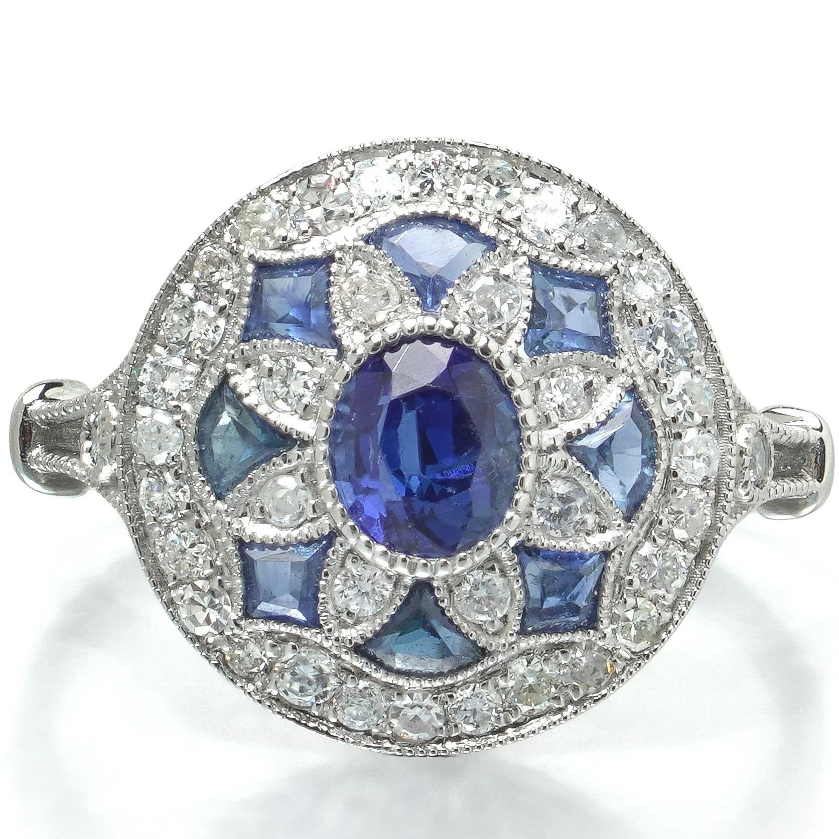 art-deco-style-platinum-sapphire-and-diamond-flowerhead-target-ring-05-head-Mozeris-Fine-Antiques.jpg