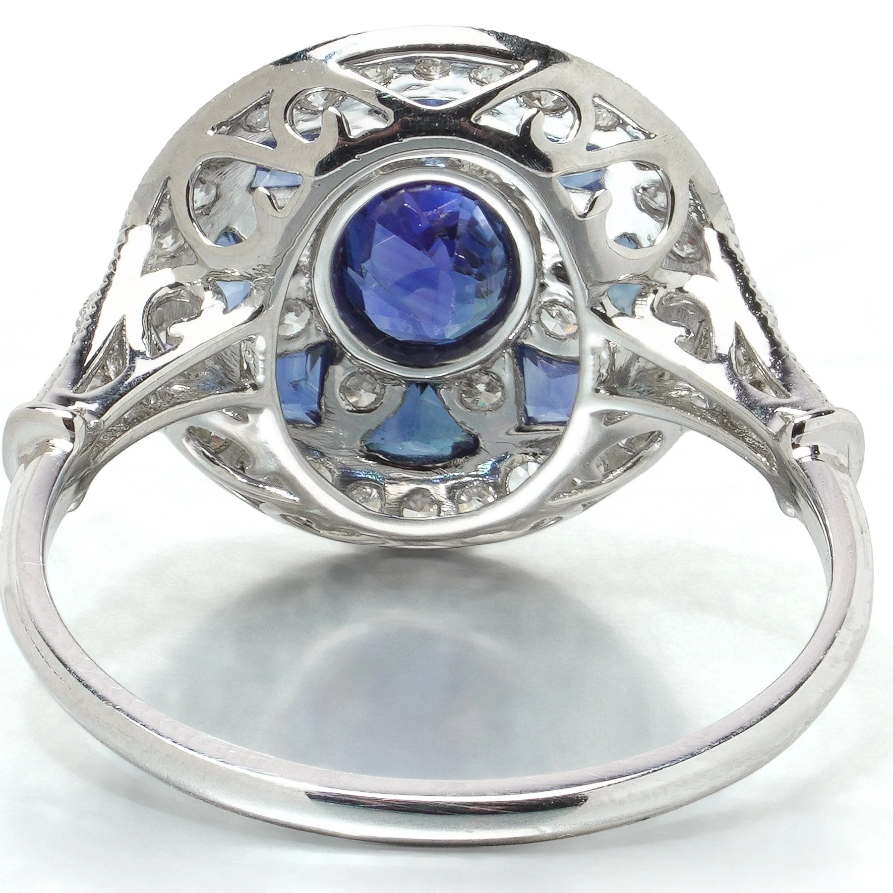 art-deco-style-platinum-sapphire-and-diamond-flowerhead-target-ring-08-gallery-Mozeris-Fine-Antiques.jpg