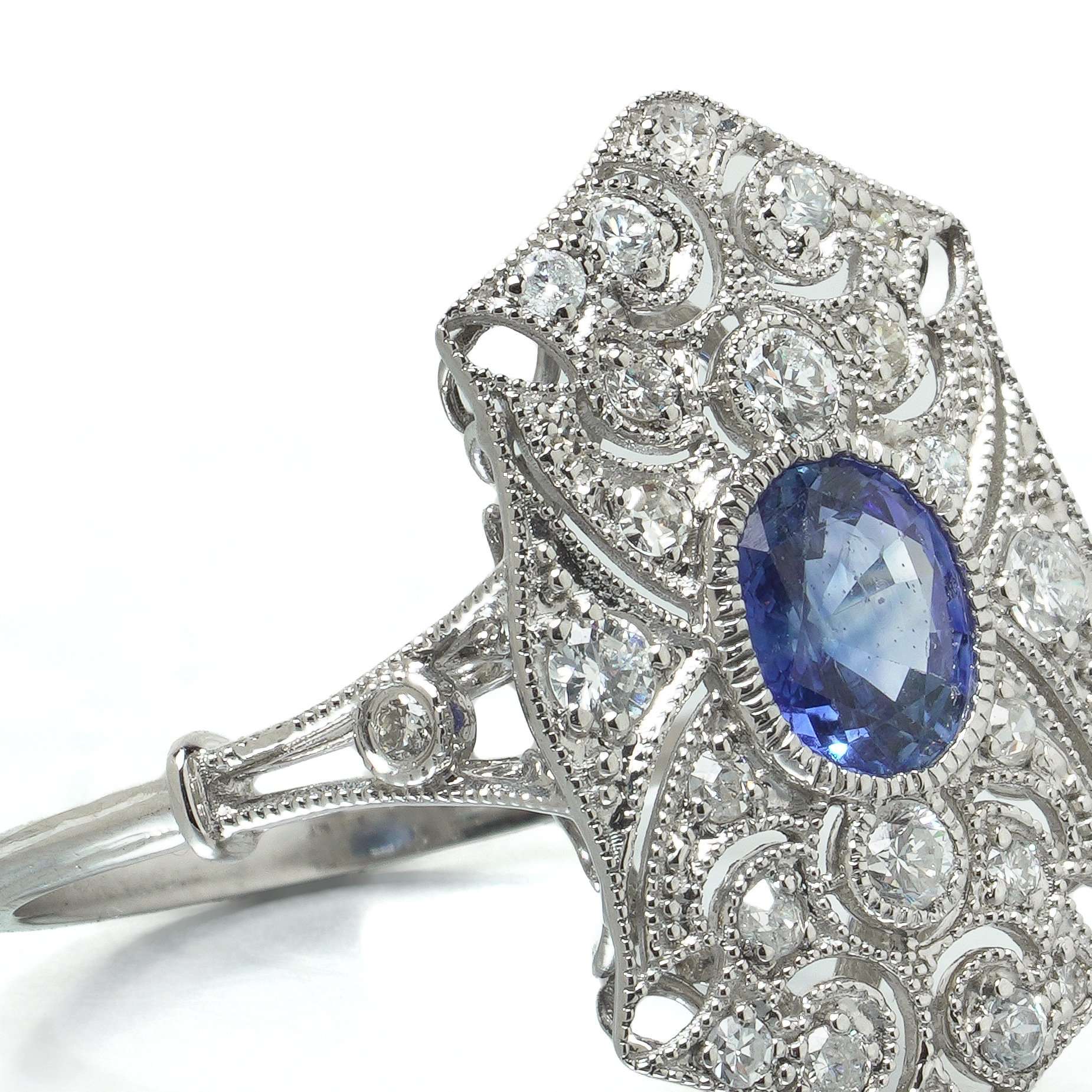 art-deco-style-platinum-sapphire-and-diamond-pierced-shield-ring-07-angle-Mozeris-Fine-Antiques.jpg