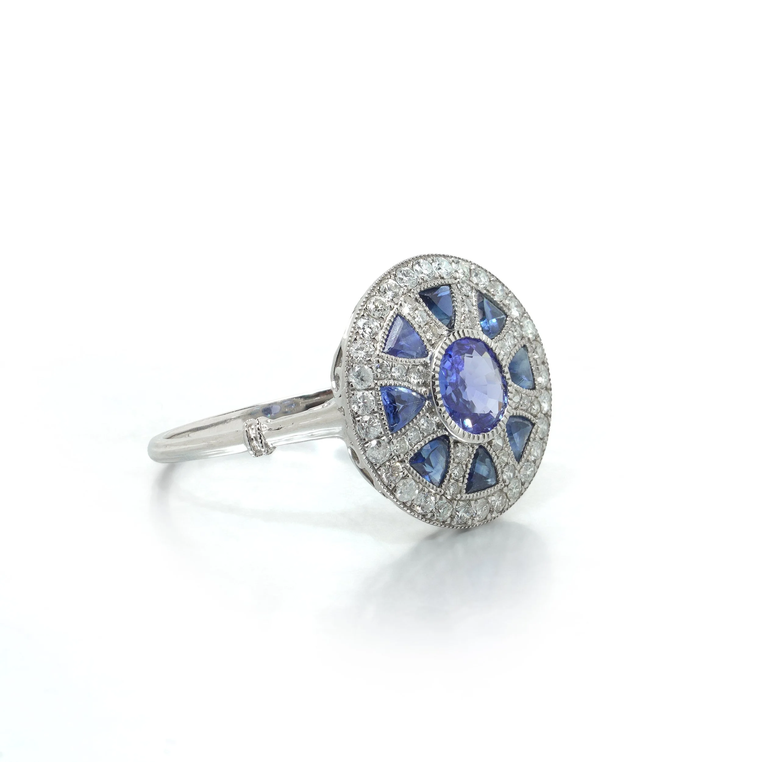 art-deco-style-platinum-sapphire-and-diamond-wheel-target-ring-03-view3-Mozeris-Fine-Antiques.jpg