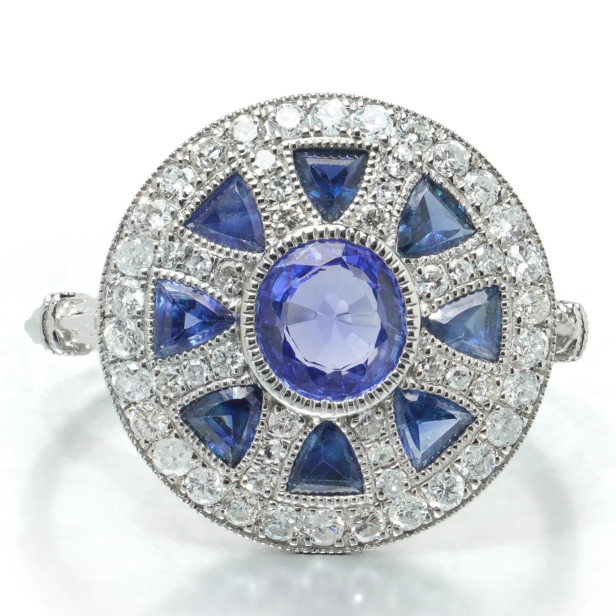 art-deco-style-platinum-sapphire-and-diamond-wheel-target-ring-05-head-Mozeris-Fine-Antiques.jpg