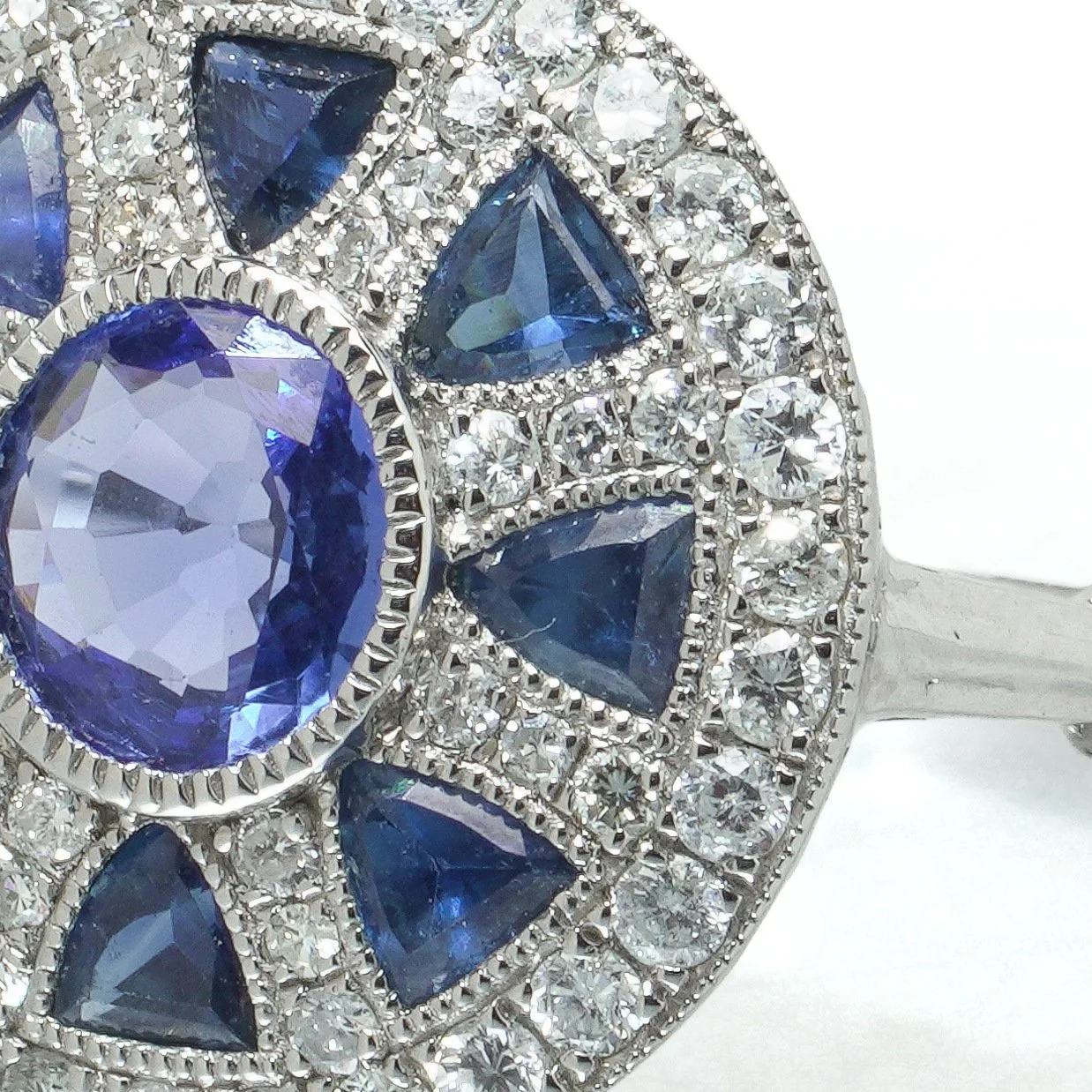 art-deco-style-platinum-sapphire-and-diamond-wheel-target-ring-06-centre-Mozeris-Fine-Antiques.jpg