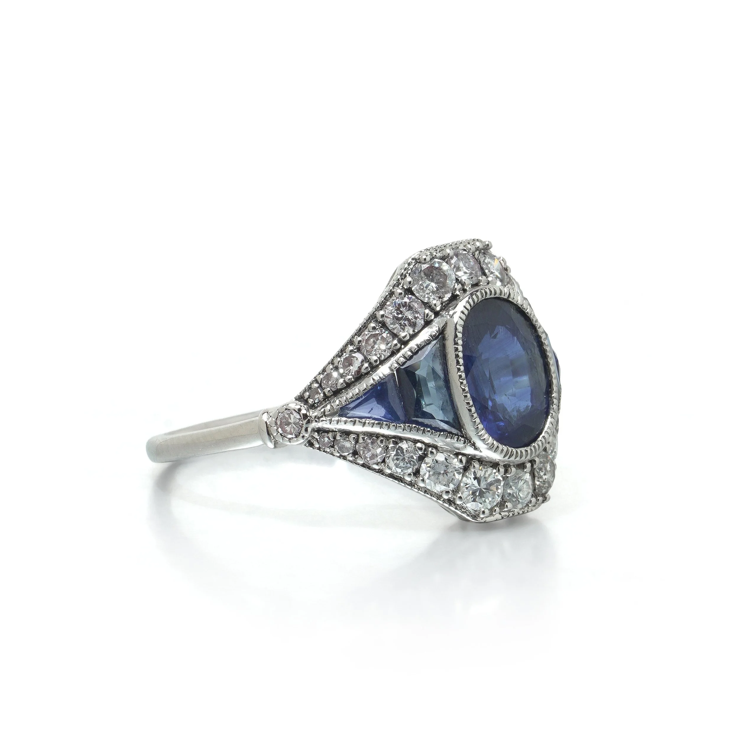 art-deco-style-platinum-145ct-sapphire-and-diamond-navette-ring-03-view3-Mozeris-Fine-Antiques.jpg