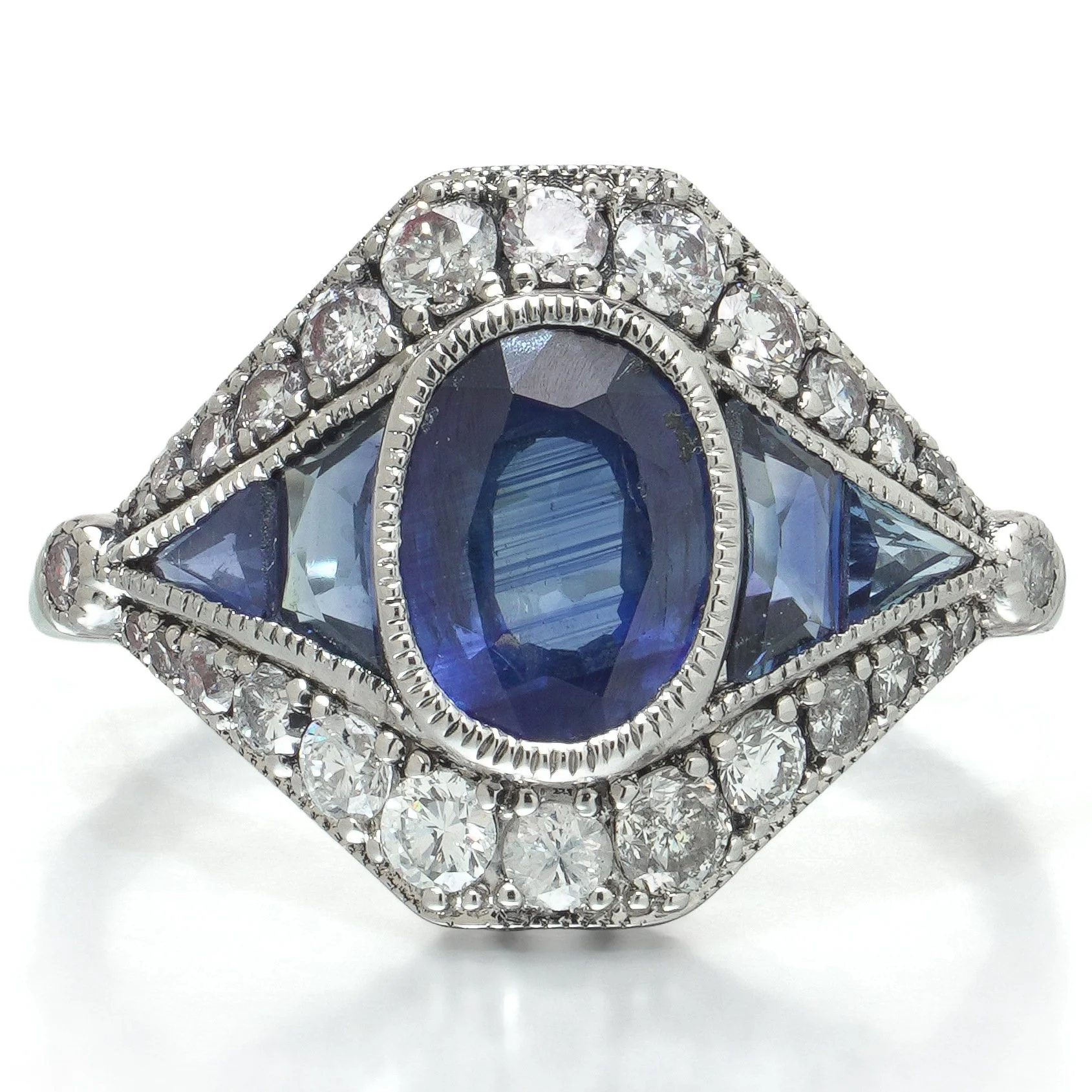 art-deco-style-platinum-145ct-sapphire-and-diamond-navette-ring-05-head-Mozeris-Fine-Antiques.jpg