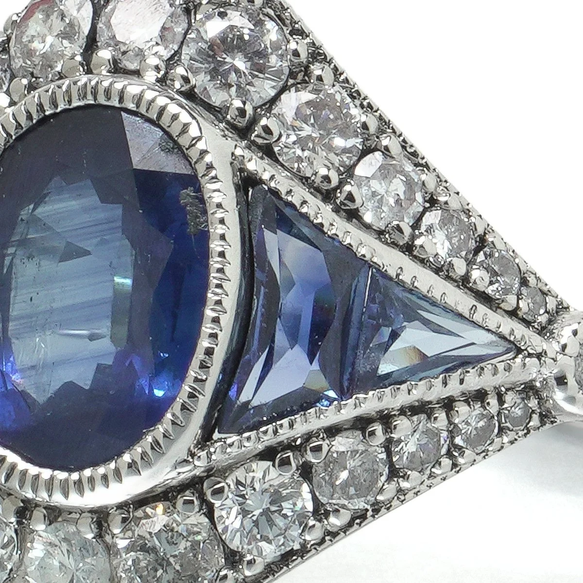 art-deco-style-platinum-145ct-sapphire-and-diamond-navette-ring-06-centre-Mozeris-Fine-Antiques.jpg