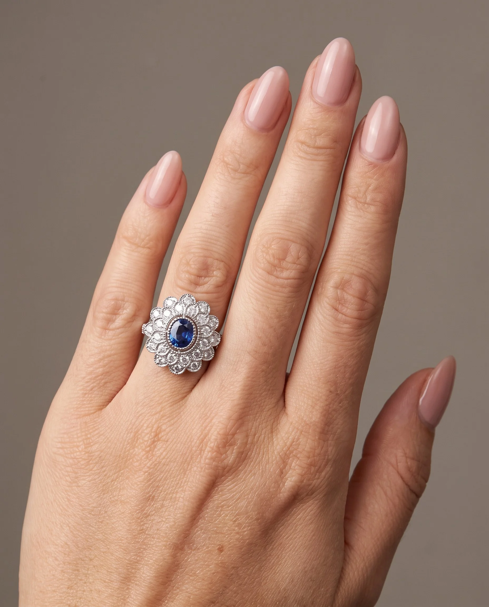 art-deco-style-platinum-ceylon-sapphire-and-diamond-flowerhead-cluster-ring-worn1-Mozeris-Fine-Antiques.jpg