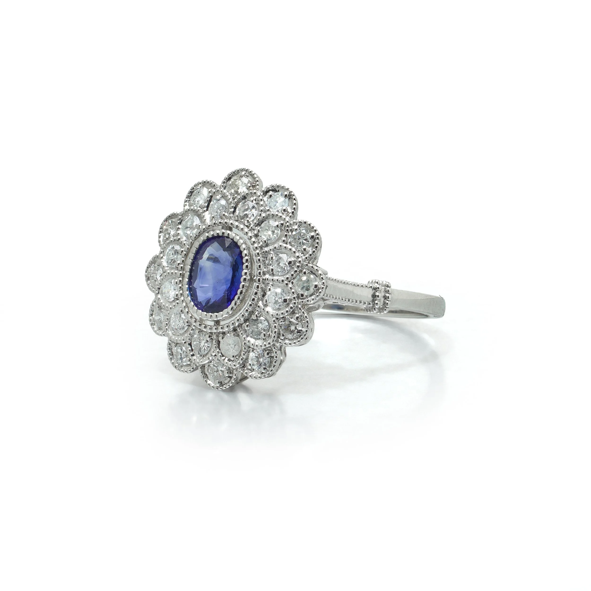 art-deco-style-platinum-ceylon-sapphire-and-diamond-flowerhead-cluster-ring-02-view2-Mozeris-Fine-Antiques.jpg