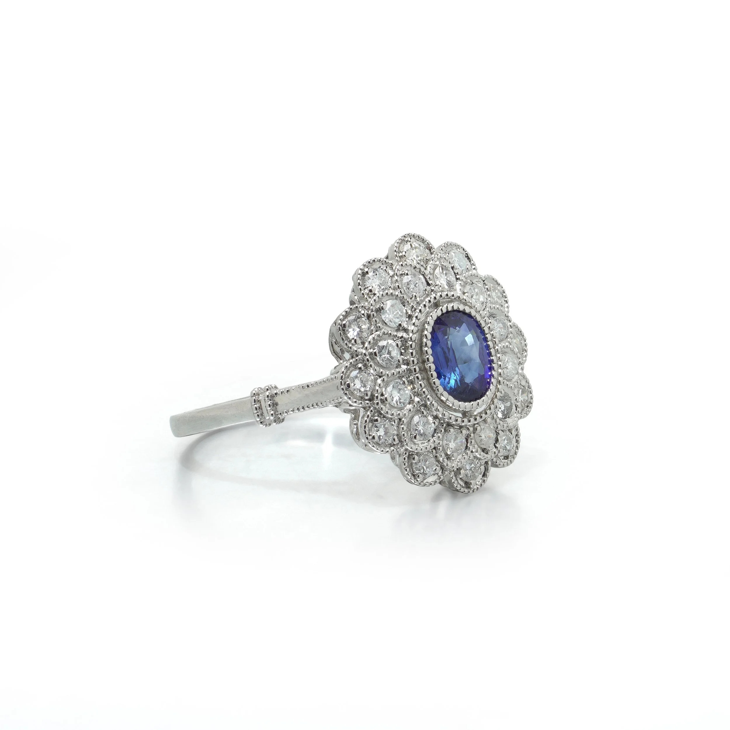 art-deco-style-platinum-ceylon-sapphire-and-diamond-flowerhead-cluster-ring-03-view3-Mozeris-Fine-Antiques.jpg