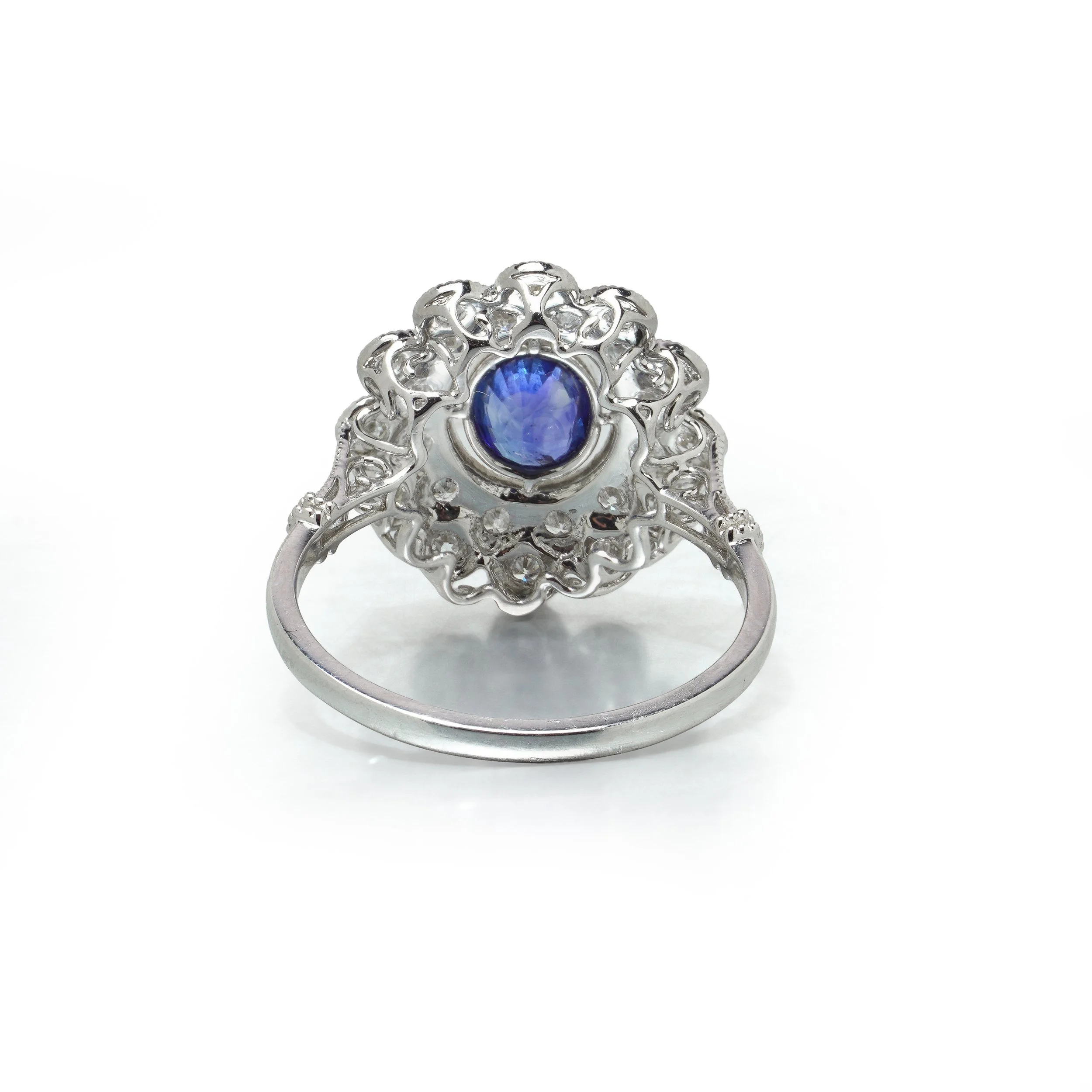 art-deco-style-platinum-ceylon-sapphire-and-diamond-flowerhead-cluster-ring-04-view4-Mozeris-Fine-Antiques.jpg
