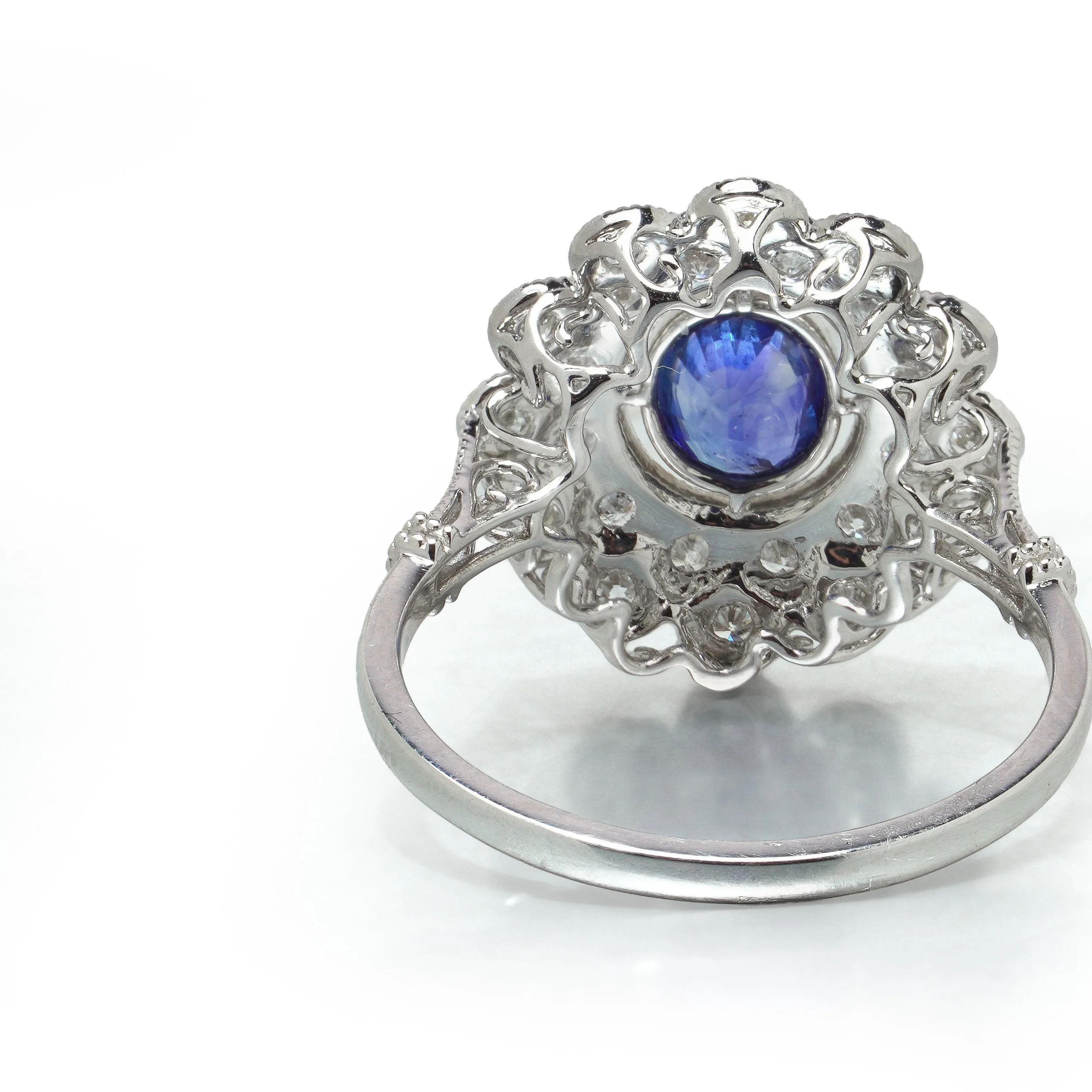 art-deco-style-platinum-ceylon-sapphire-and-diamond-flowerhead-cluster-ring-08-gallery-Mozeris-Fine-Antiques.jpg