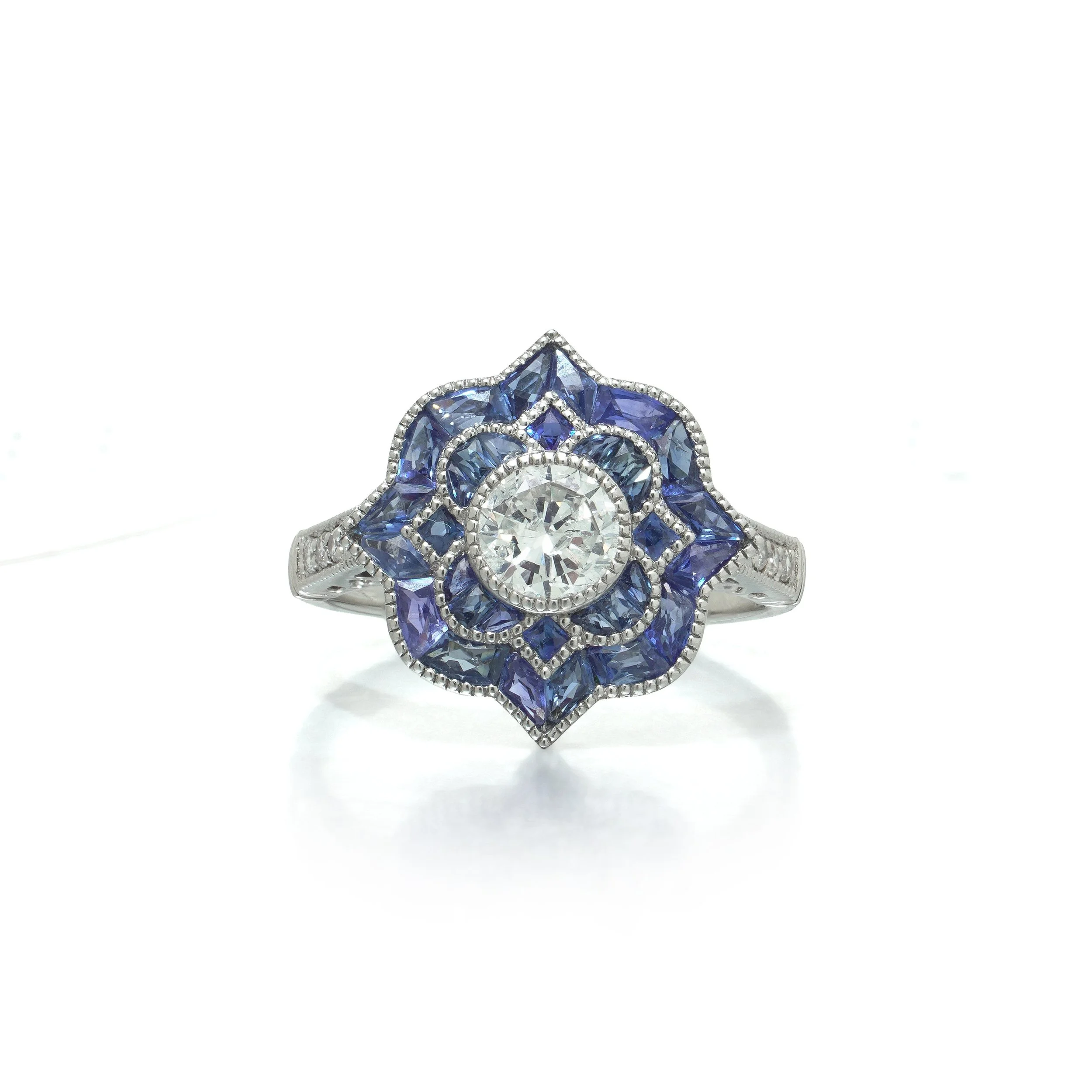 Art Deco Style Platinum Diamond and Calibre Sapphire Star Cluster Ring