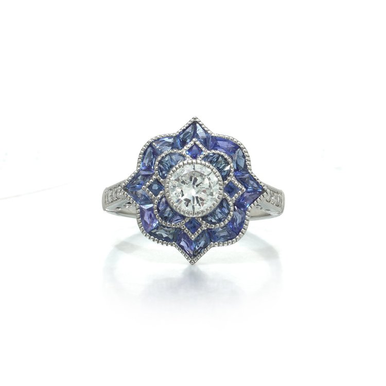 Art Deco Style Platinum Diamond and Calibre Sapphire Star Cluster Ring