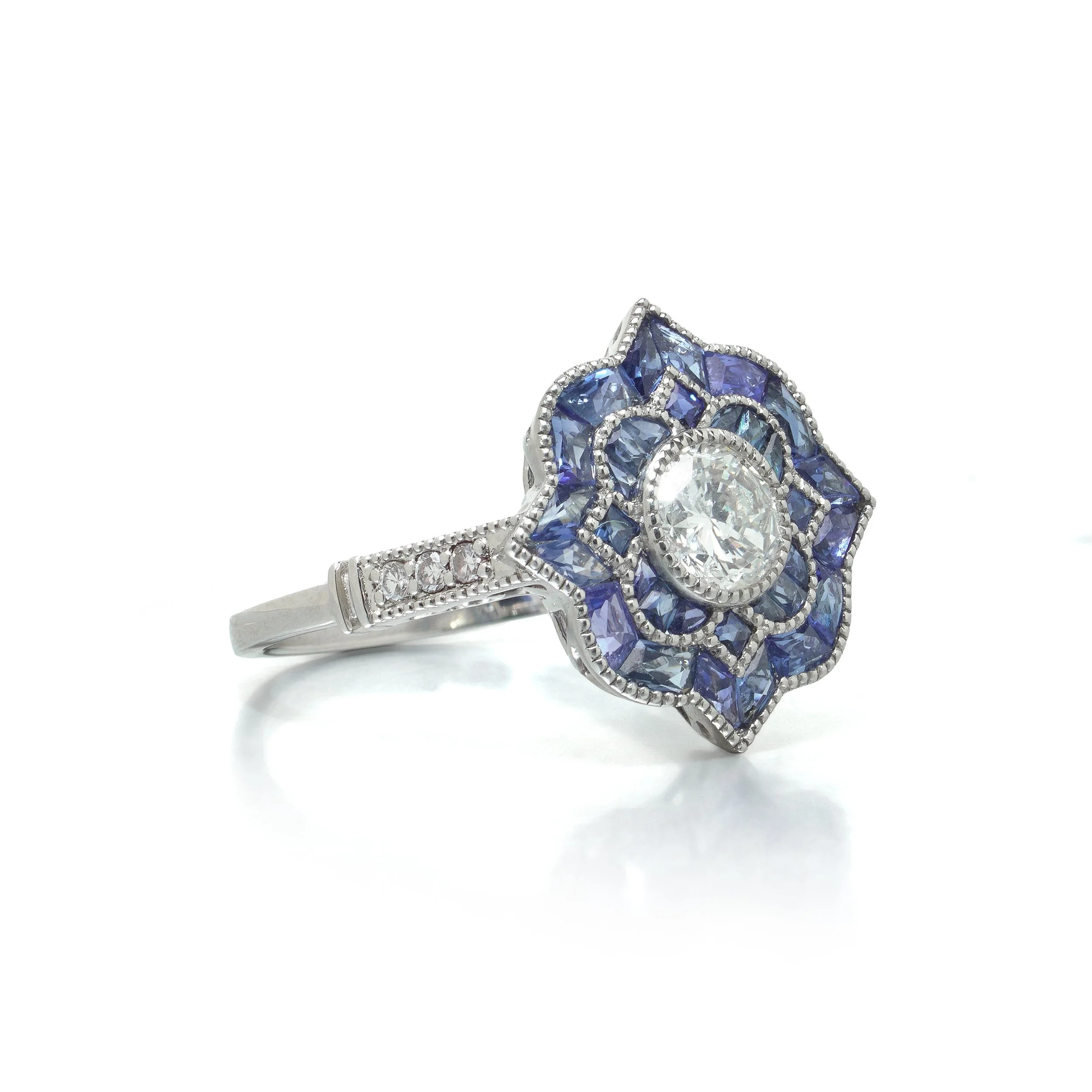 art-deco-style-platinum-diamond-and-calibre-sapphire-star-cluster-ring-03-view3-Mozeris-Fine-Antiques.jpg