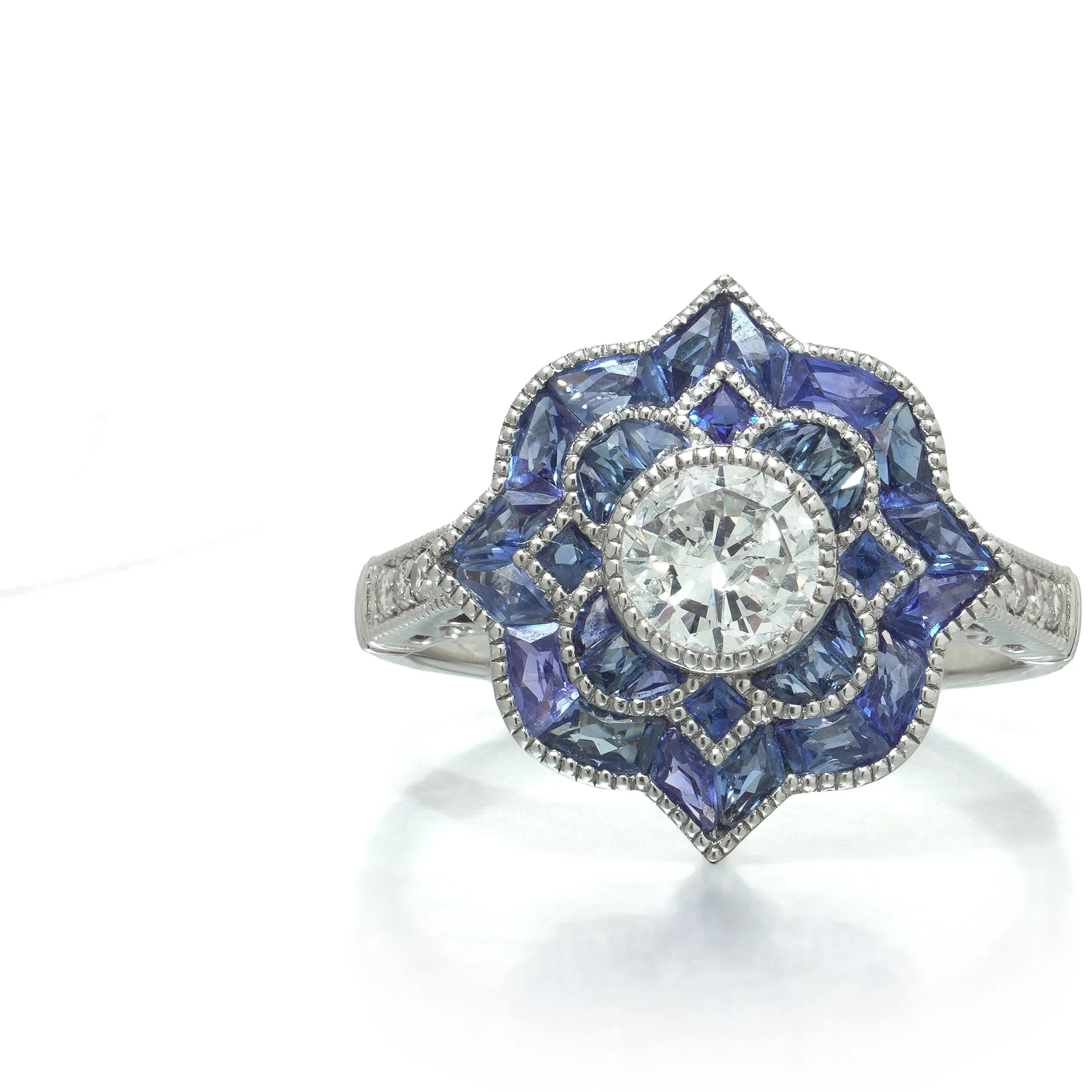 art-deco-style-platinum-diamond-and-calibre-sapphire-star-cluster-ring-05-head-Mozeris-Fine-Antiques.jpg