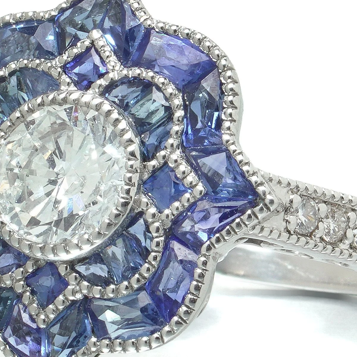 art-deco-style-platinum-diamond-and-calibre-sapphire-star-cluster-ring-06-centre-Mozeris-Fine-Antiques.jpg