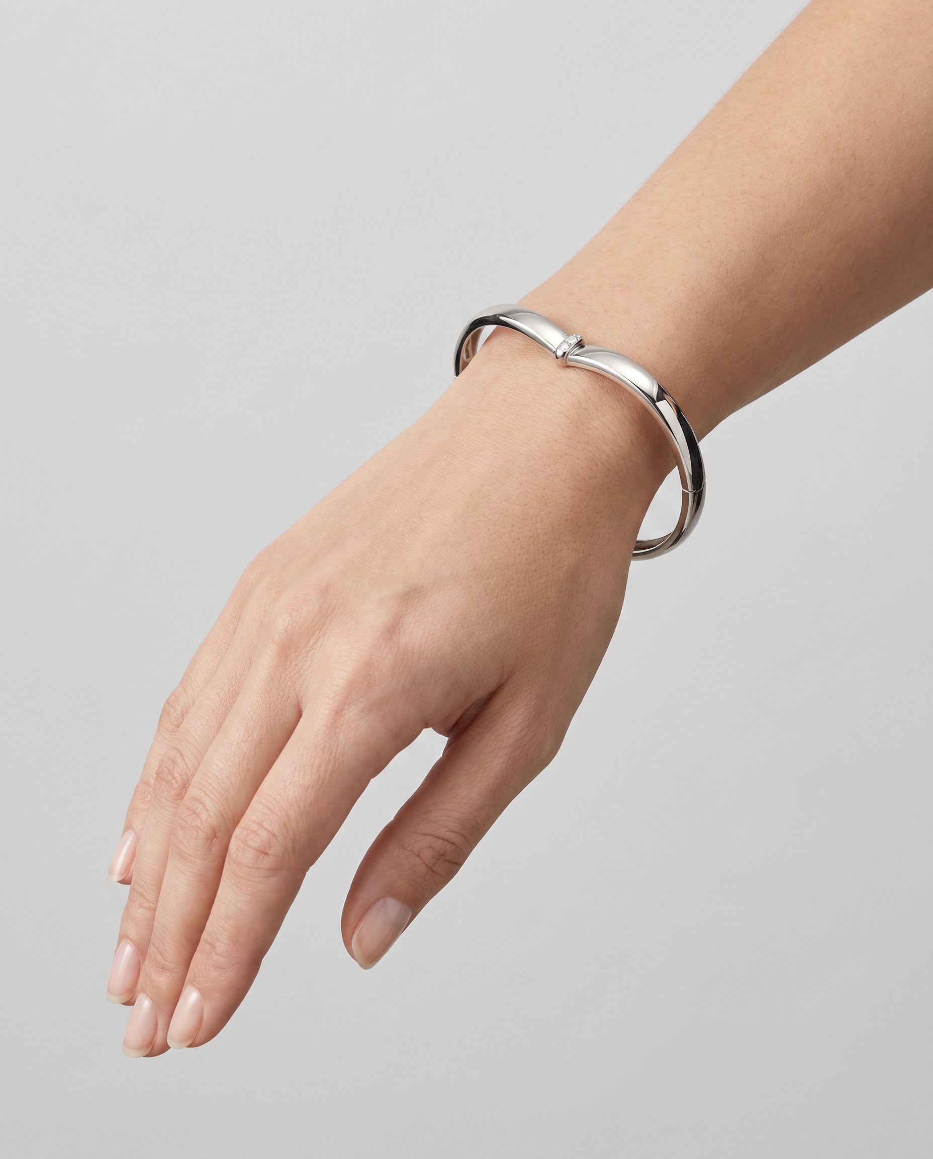Piaget-18KT-White-Gold-Diamond-Heart-Bangle-99-worn-Mozeris-Fine-Antiques.jpg